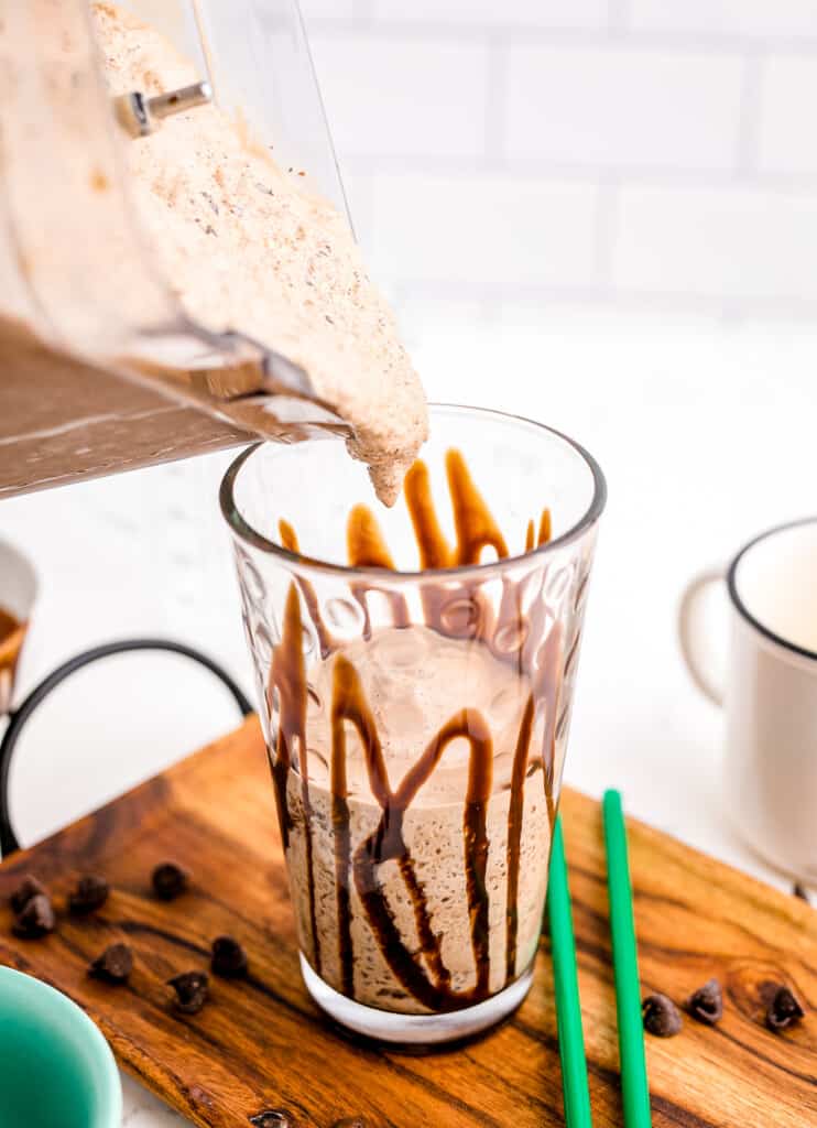 Pouring java chip Java Chip Frappuccino into glass with chocolate syrup