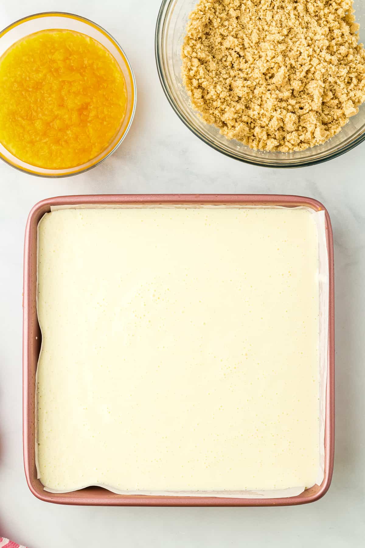 Cheesecake layer in square baking dish