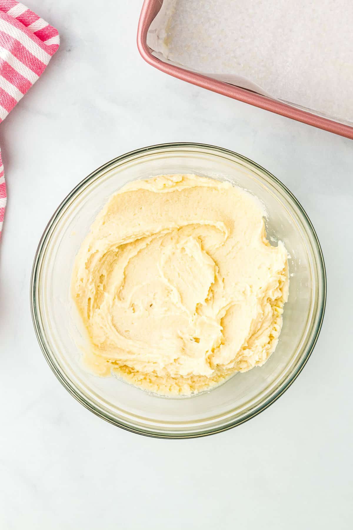 Shortbread crust dough in mixing bowl