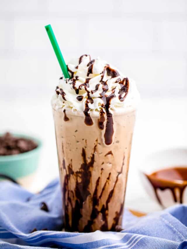 Java Chip Frappuccino in glass with whipped cream and straw