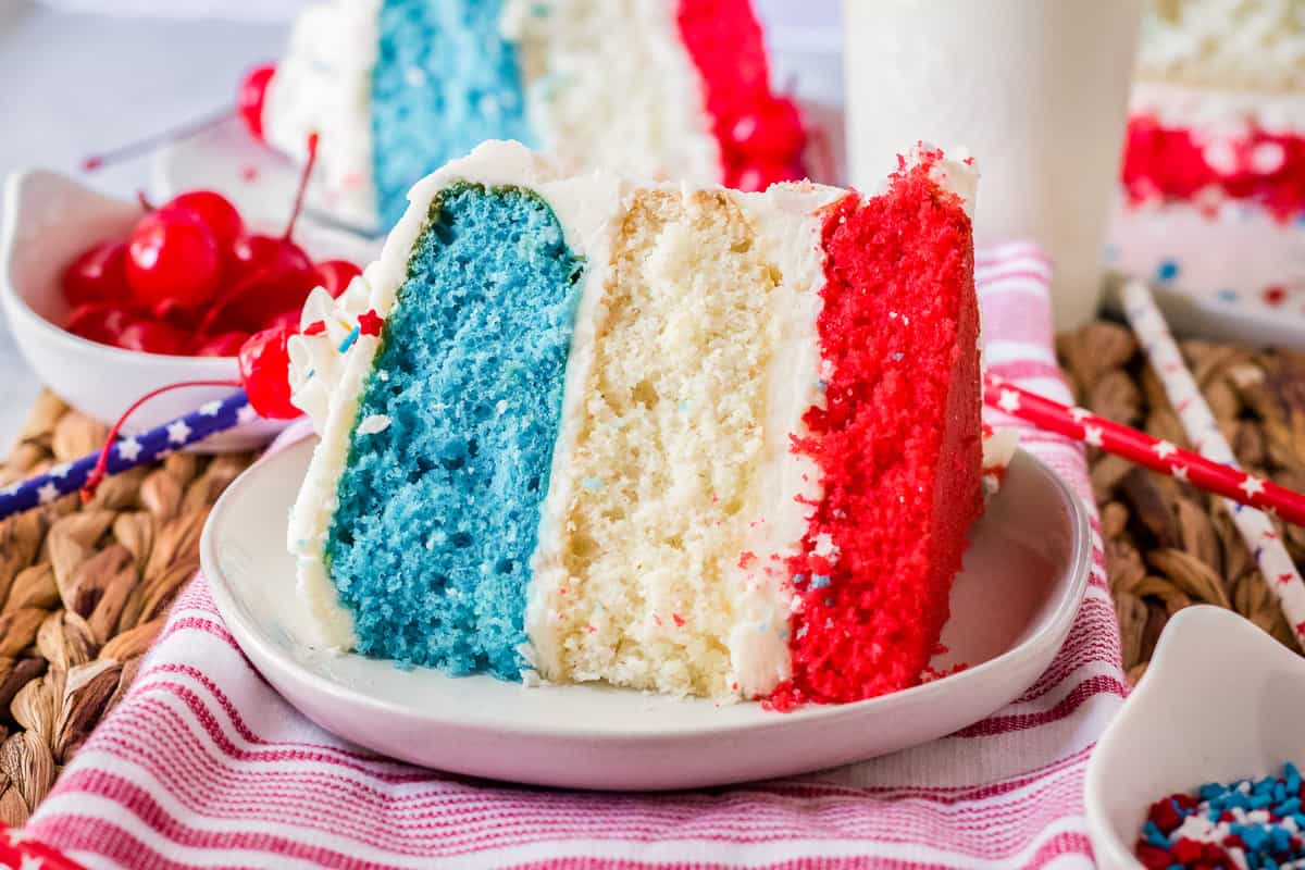 Slice of 4th of July Cake on white plate