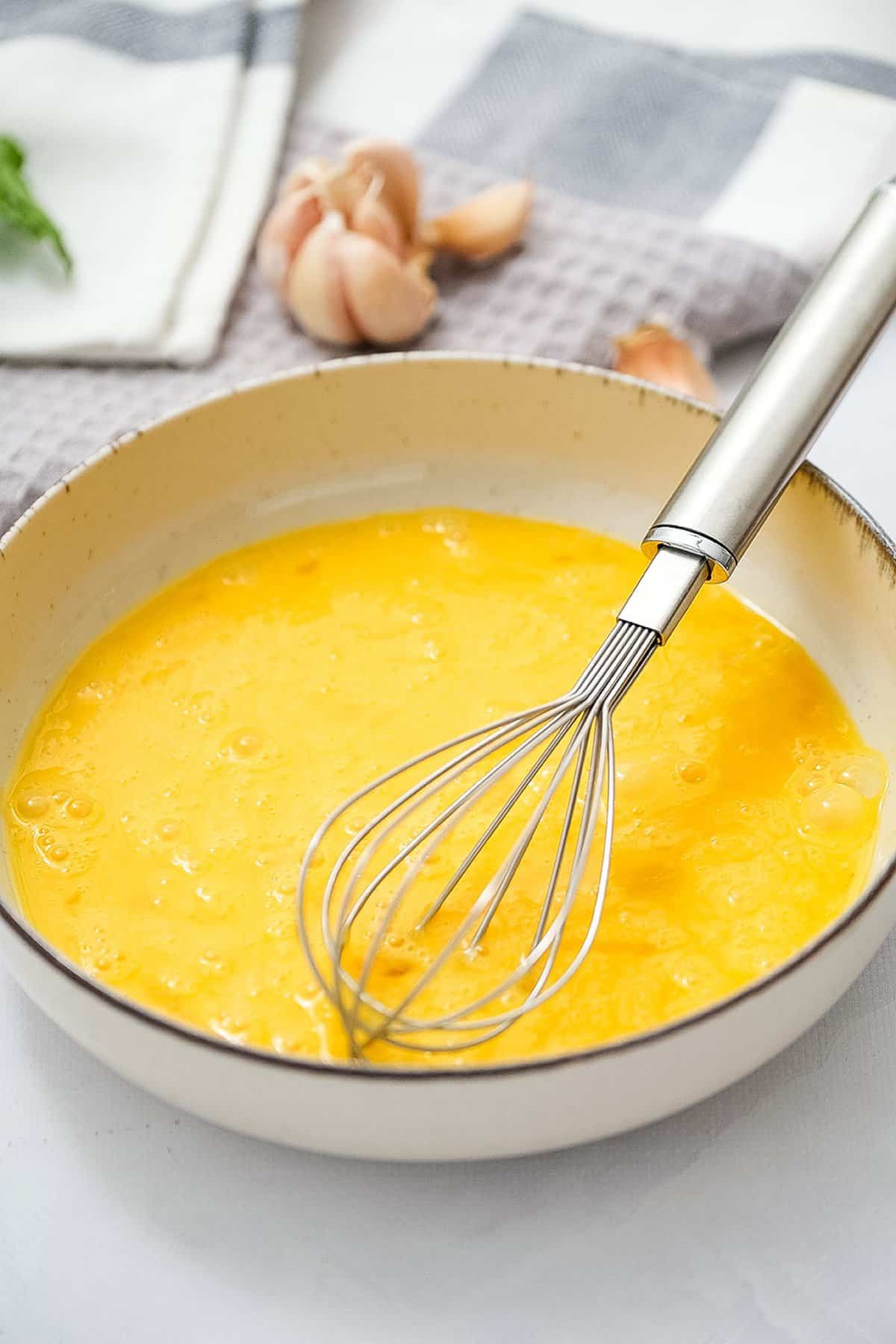 Whisking eggs in a bowl