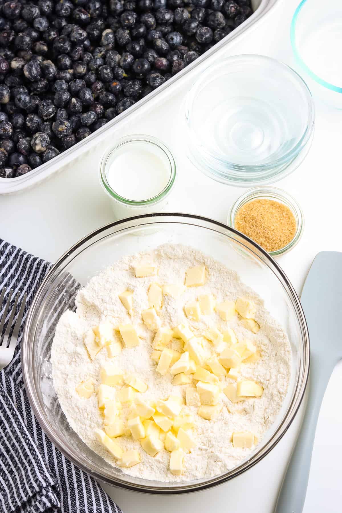 Bowl of cut butter and flour.