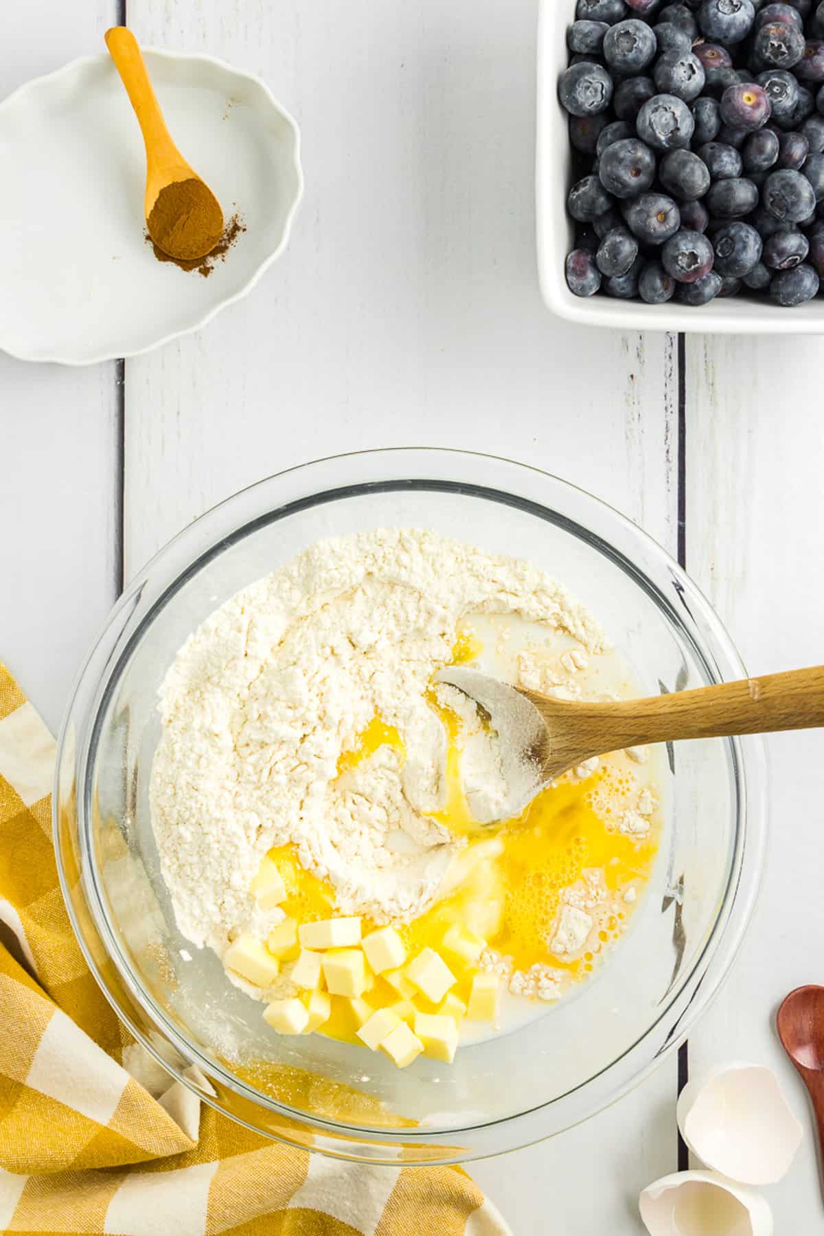 Mixing wet and dry ingredients in glass bowl