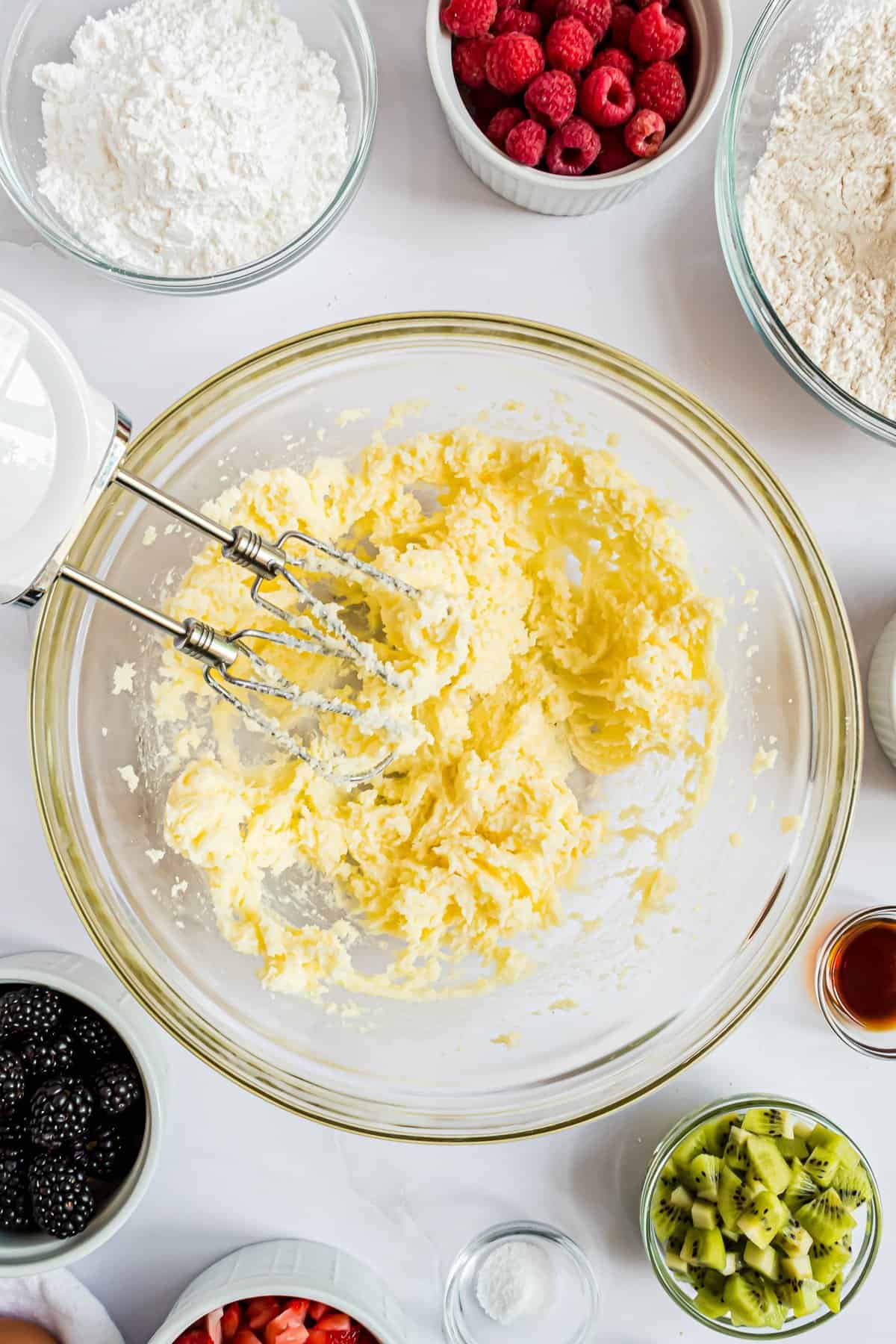 Creaming ingredients together in bowl for sugar cookie crust