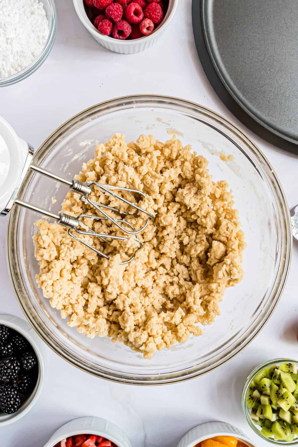 Glass bowl with sugar cookie dough