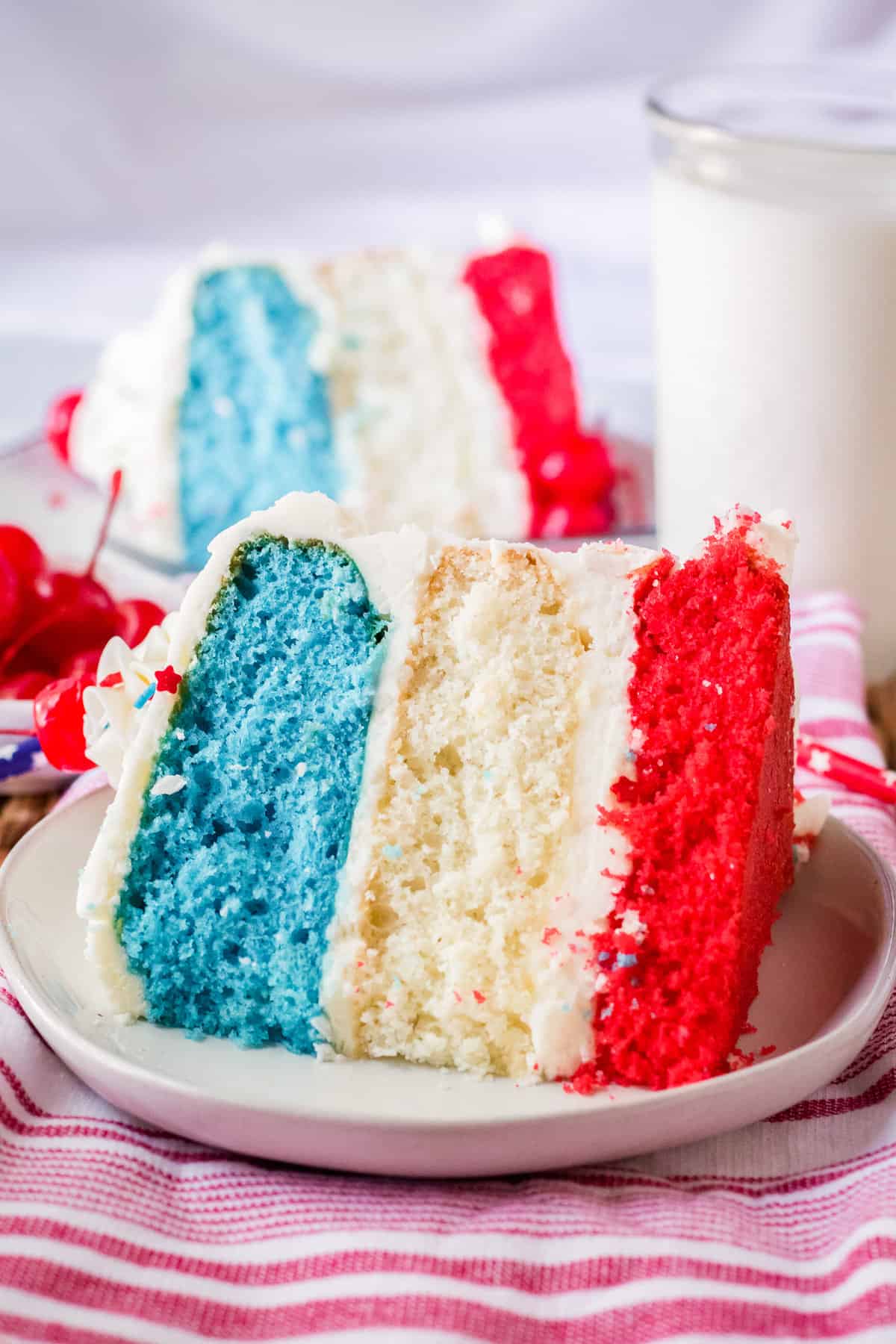 Slice of 4th of July Cake on white plate