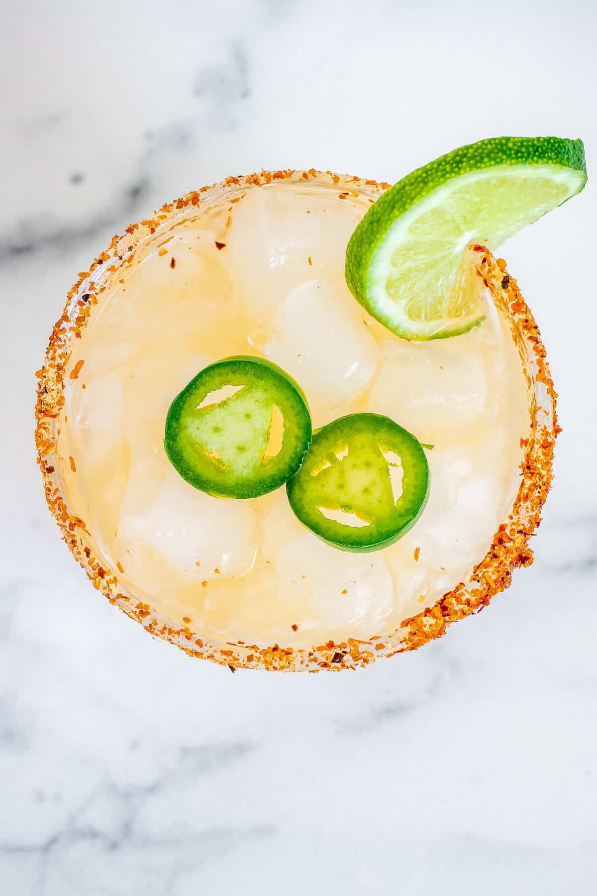Overhead view of spicy margarita in glass