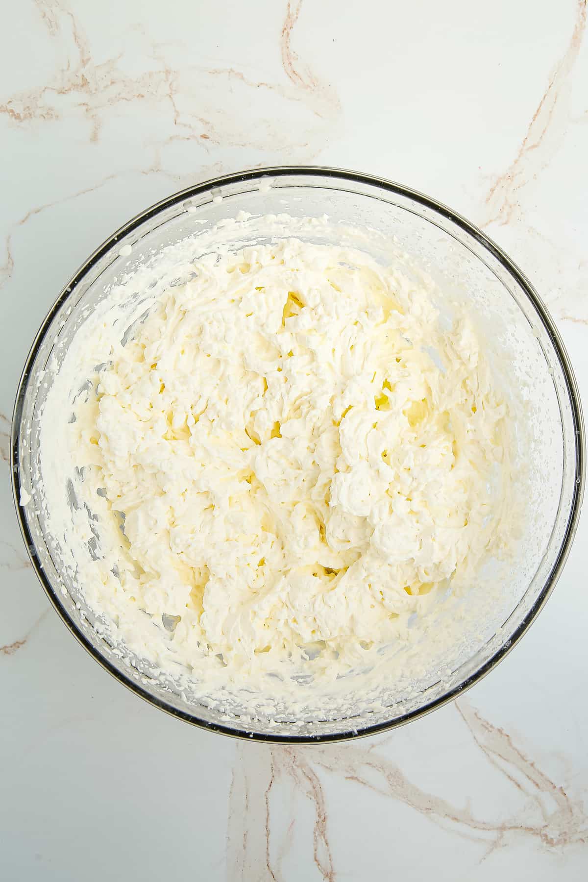 Whipped cream cheese in bowl