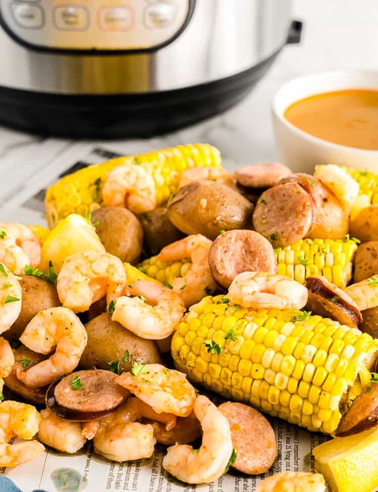 Instant Pot Shrimp Boil laid on newspaper