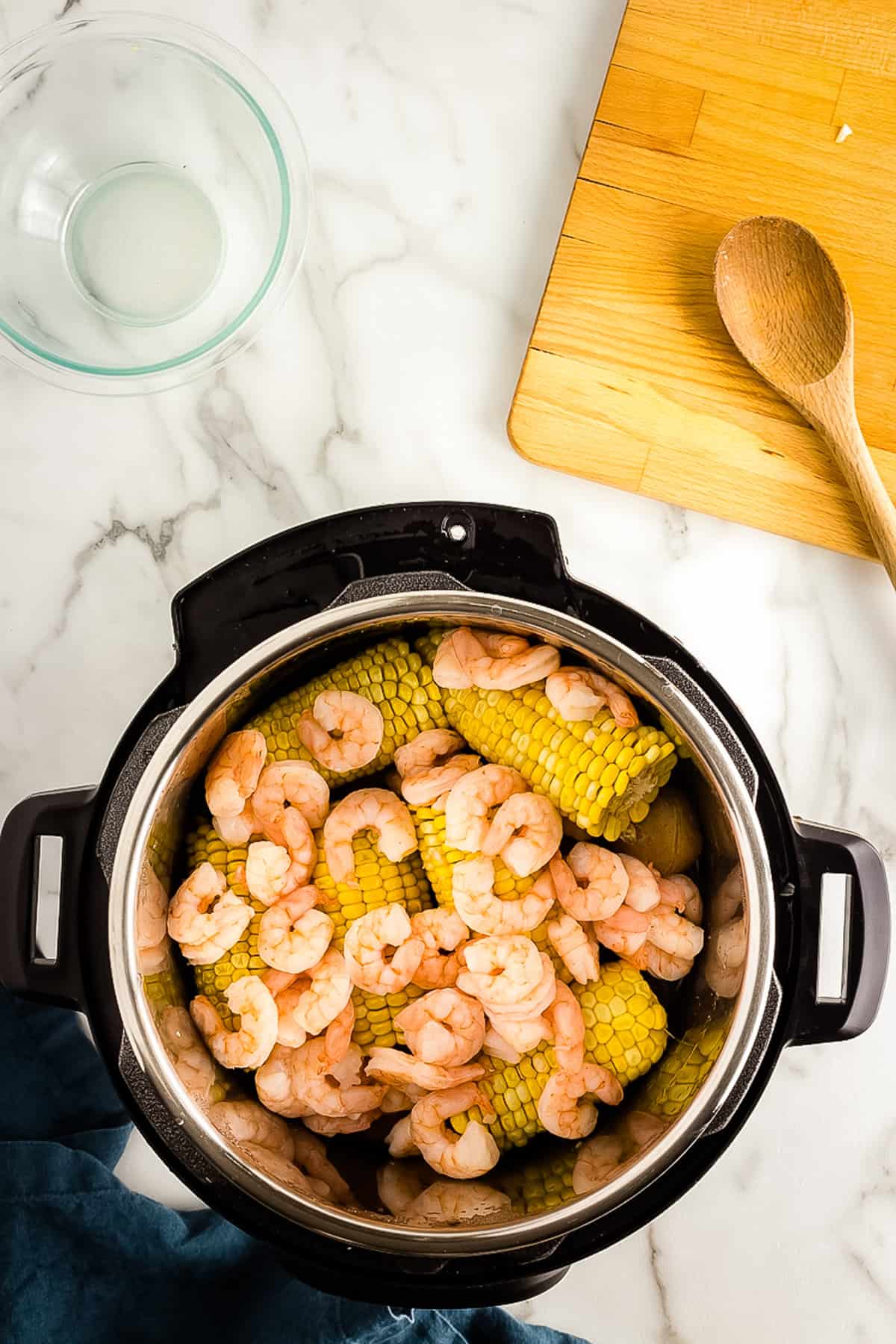 Instant Pot with cooked Shrimp Boil in it