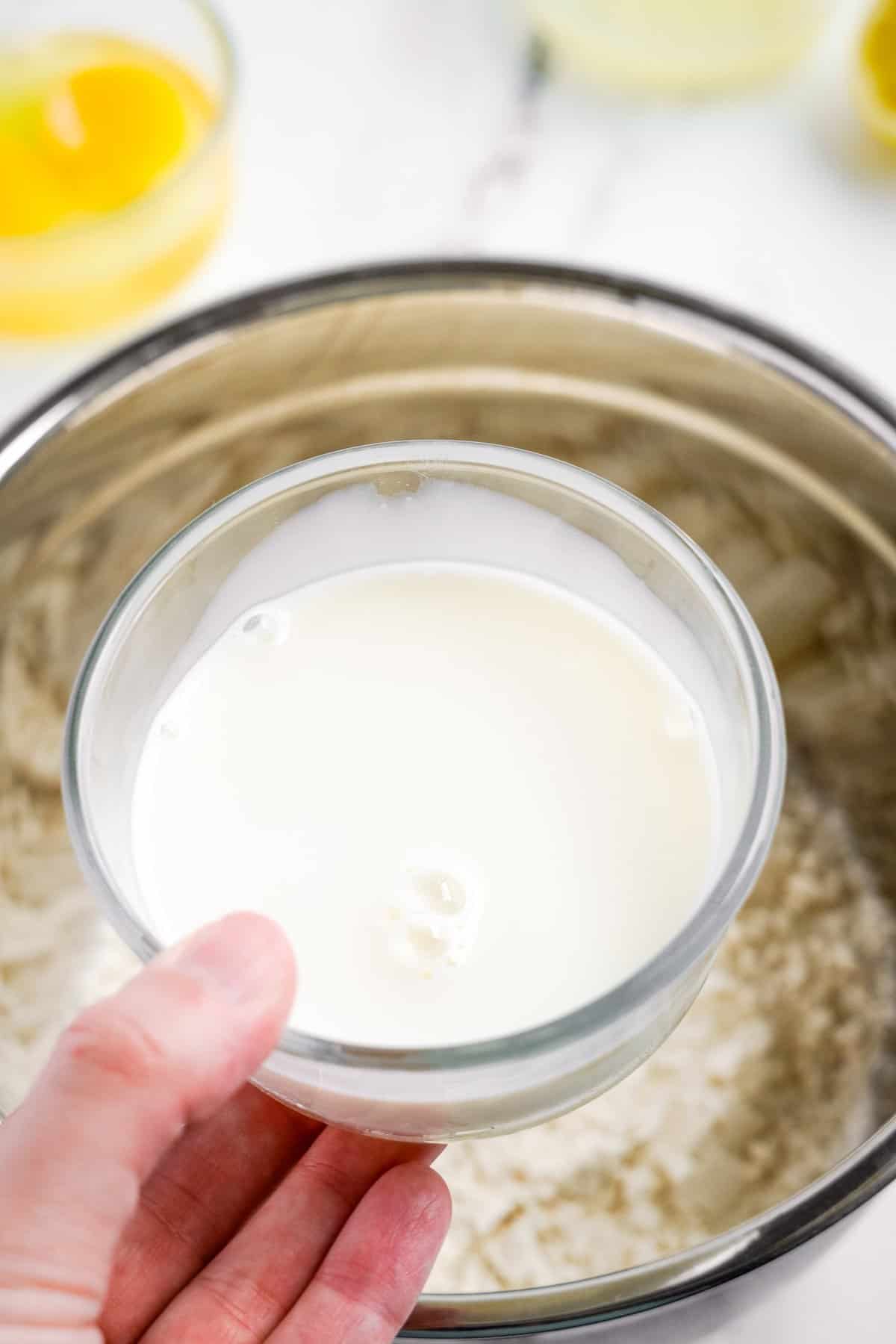 Adding milk to bread mix