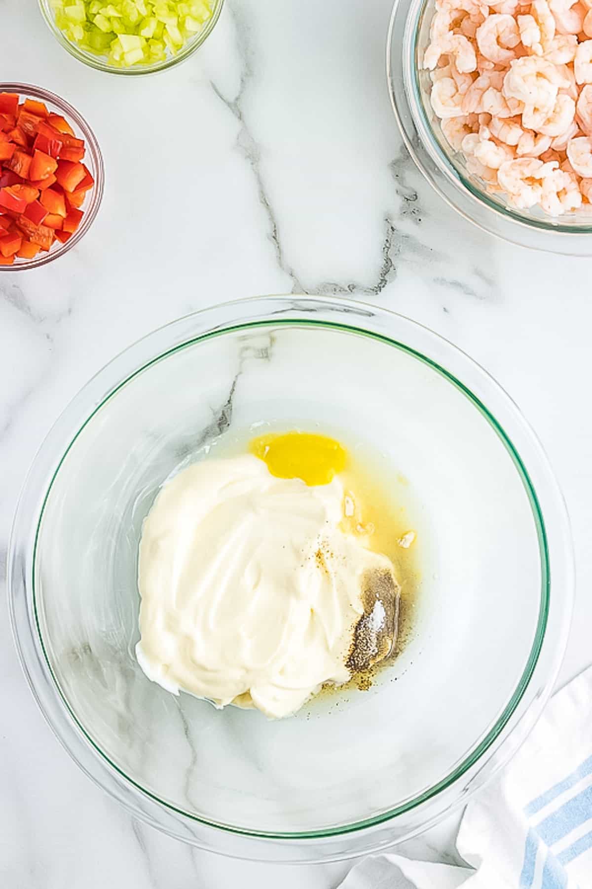 Ingredients for mayonnaise dressing in bowl