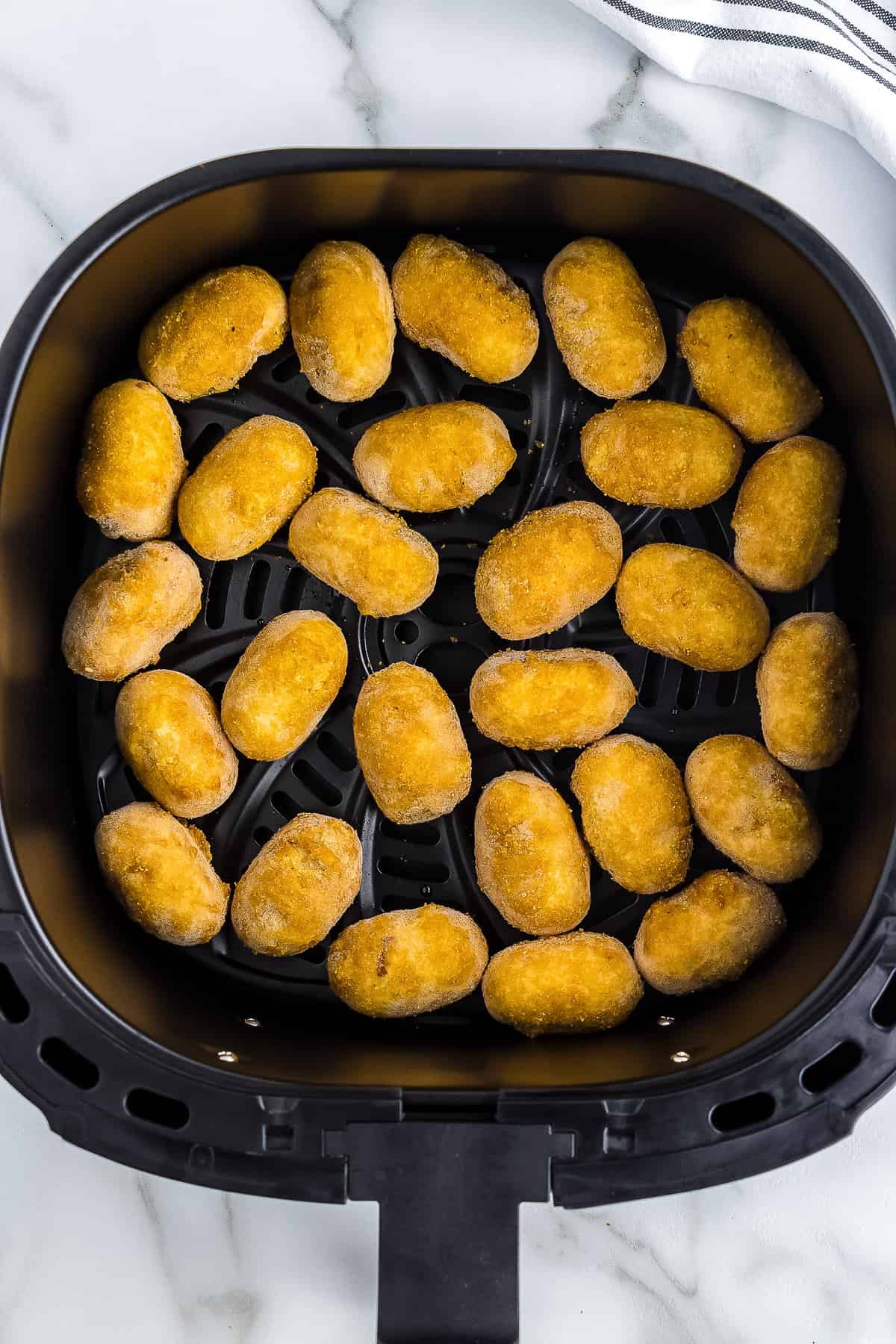 frozen mini corn dogs in air fryer basket