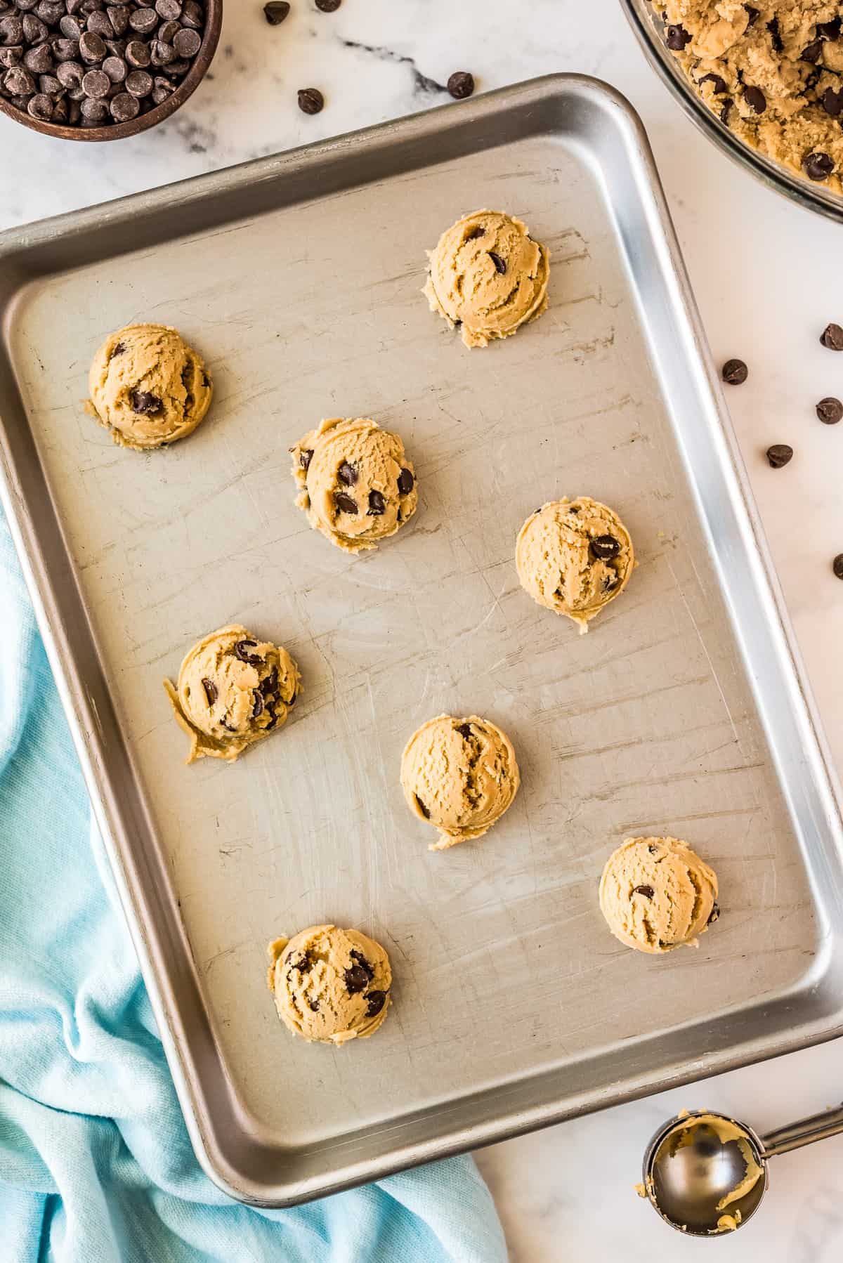Chocolate Chip Cookie Dough scoops on baking sheet