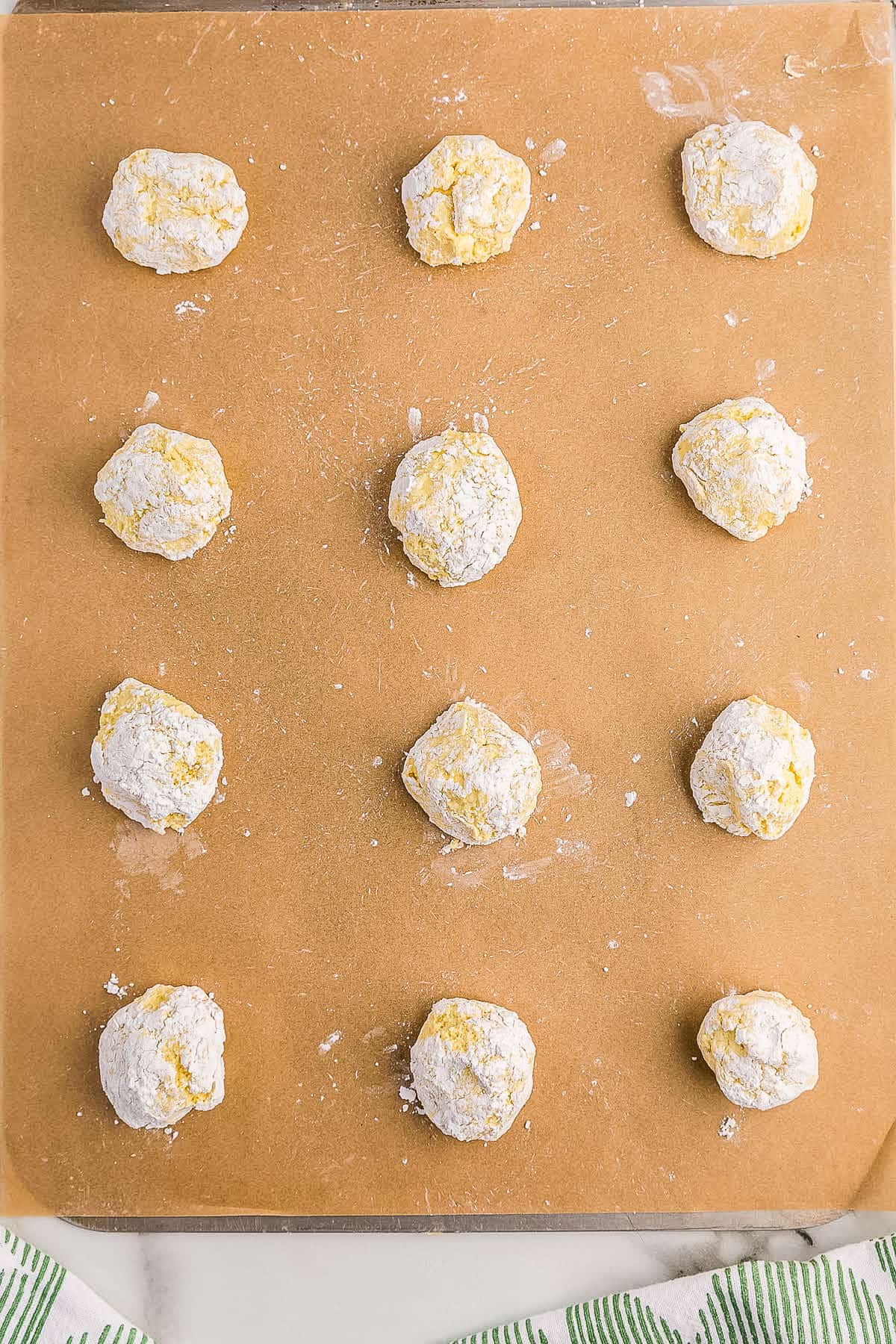 Cool whip cookies rolled in powdered sugar