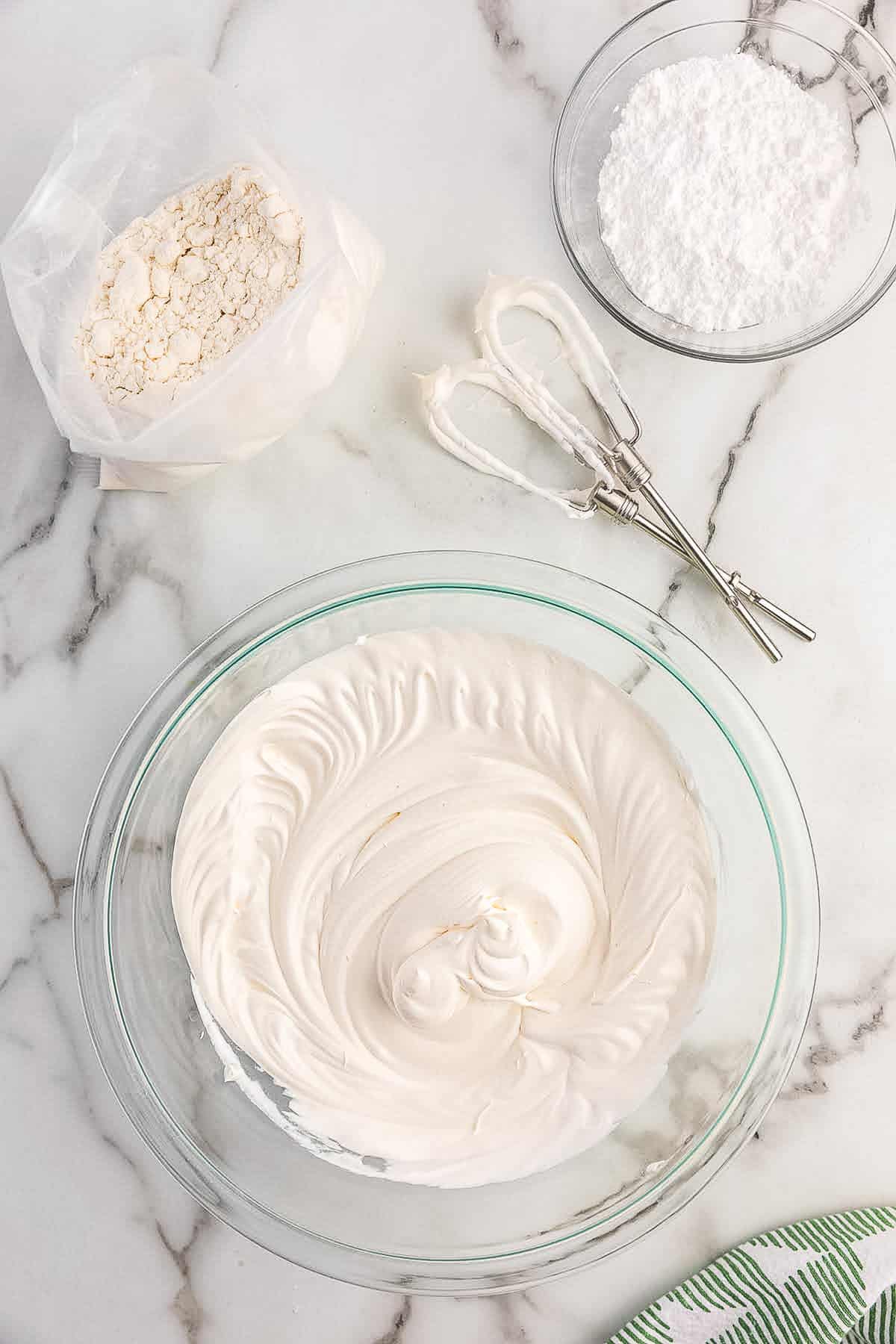 Glass bowl with cool whip cookie batter