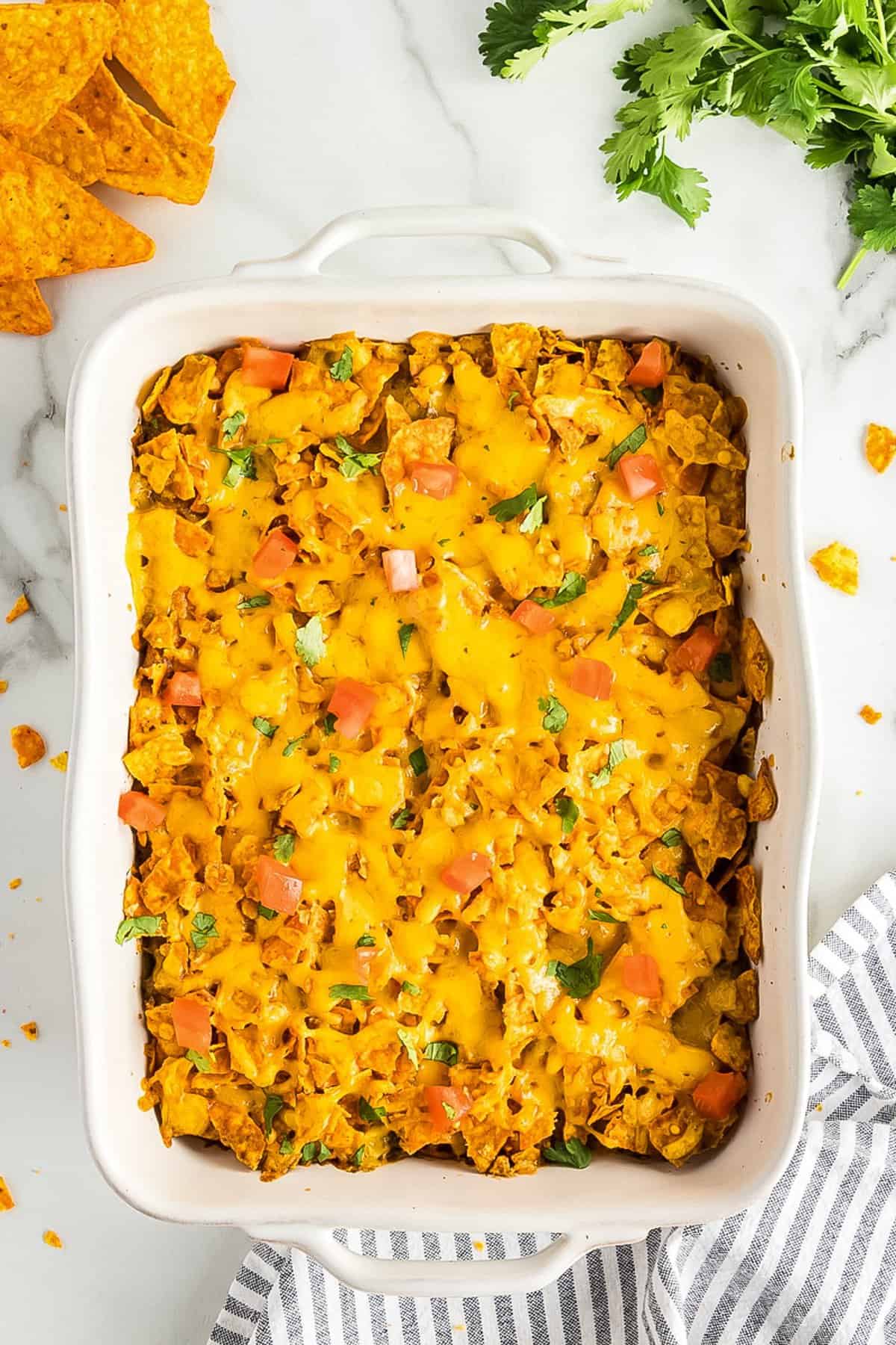 Baked Dorito Casserole in white baking dish