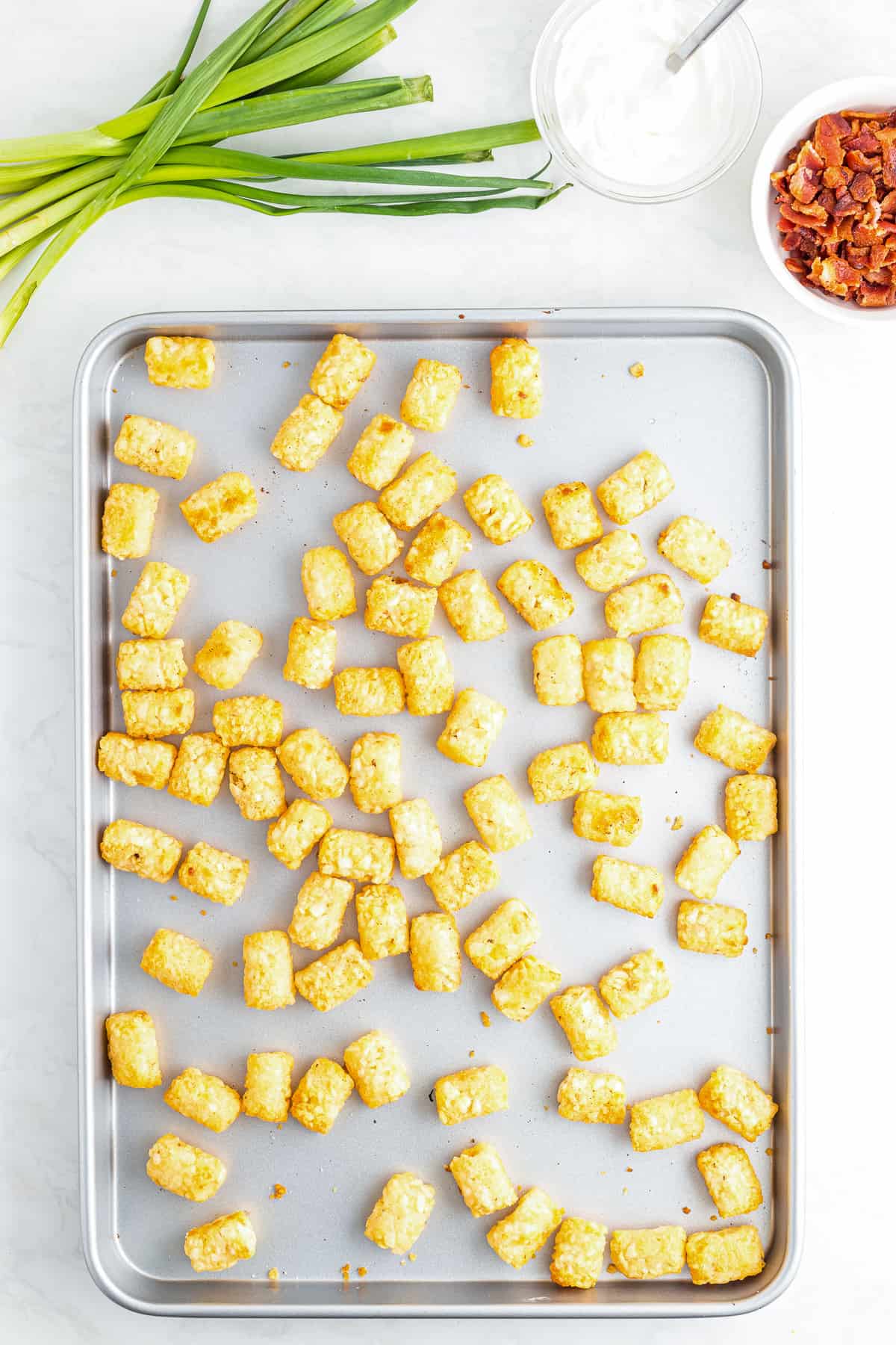 Baking sheet with baked tater tots