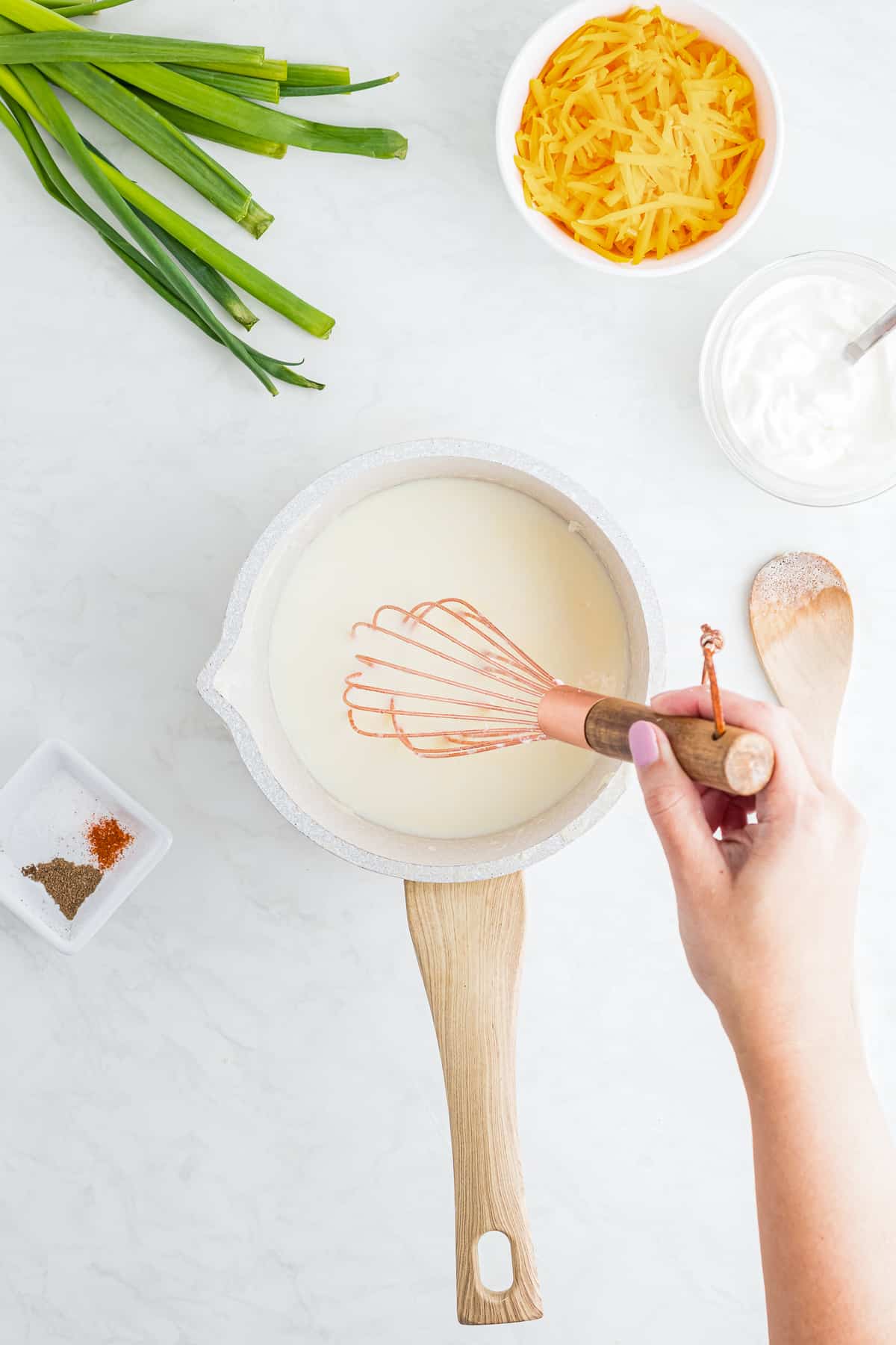 Whisking roux in saucepan