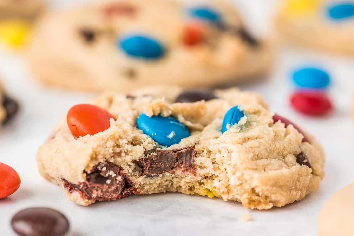 Soft M & M Cookies with bite taken out of it