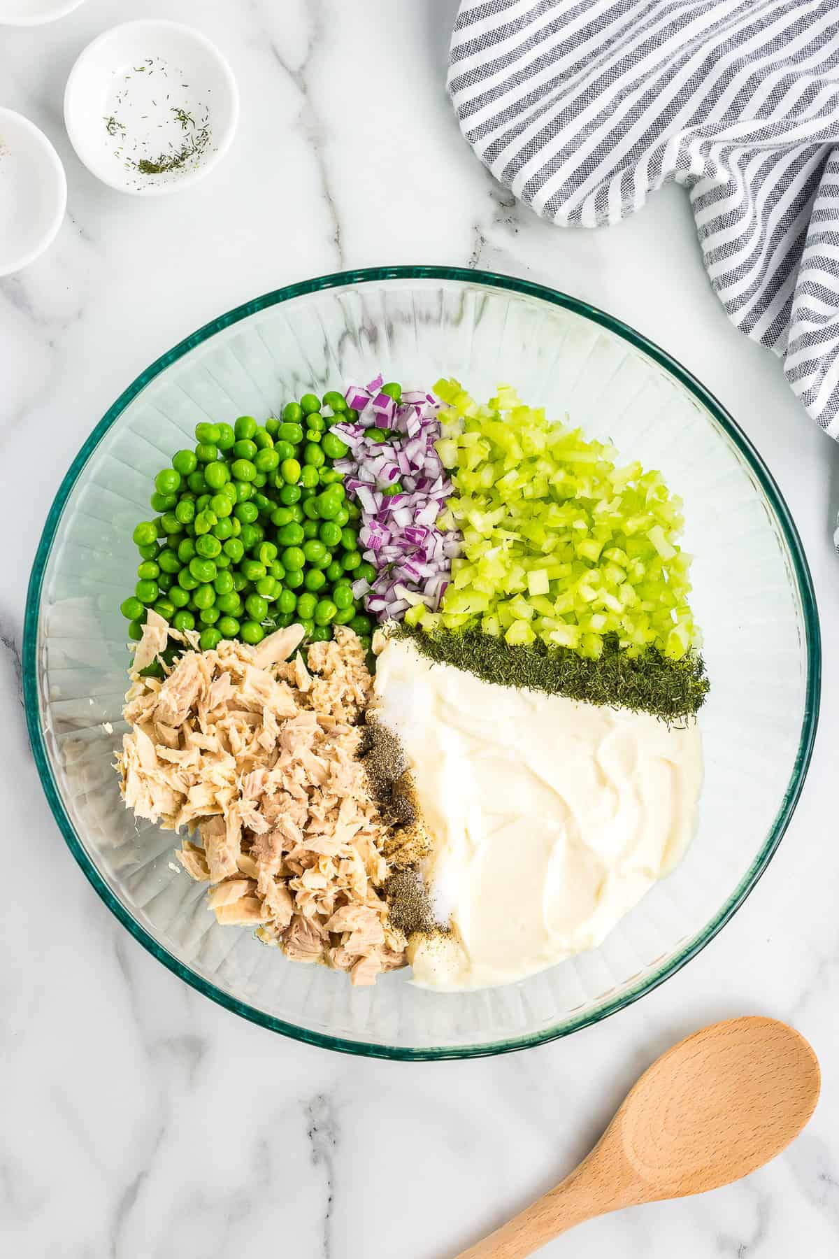 Ingredients in bowl before stirring for pasta salad