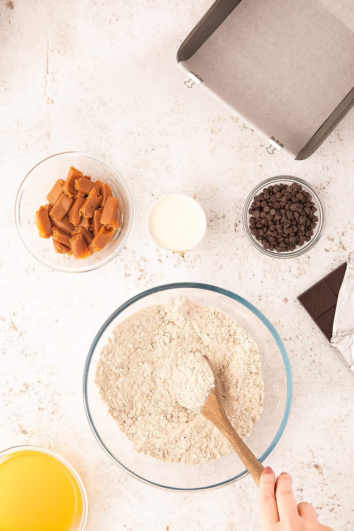 Stirring oat crust together