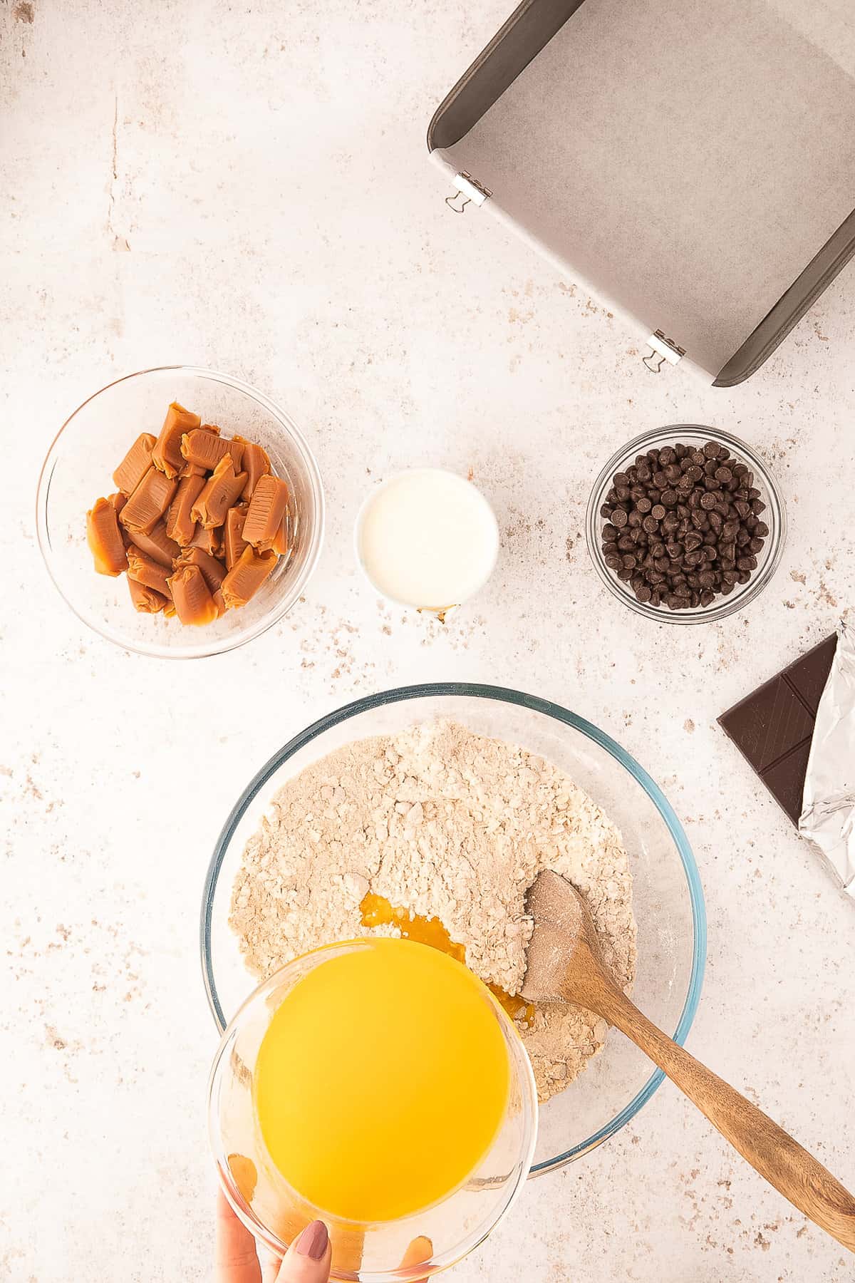 Adding butter to oat crust ingredients