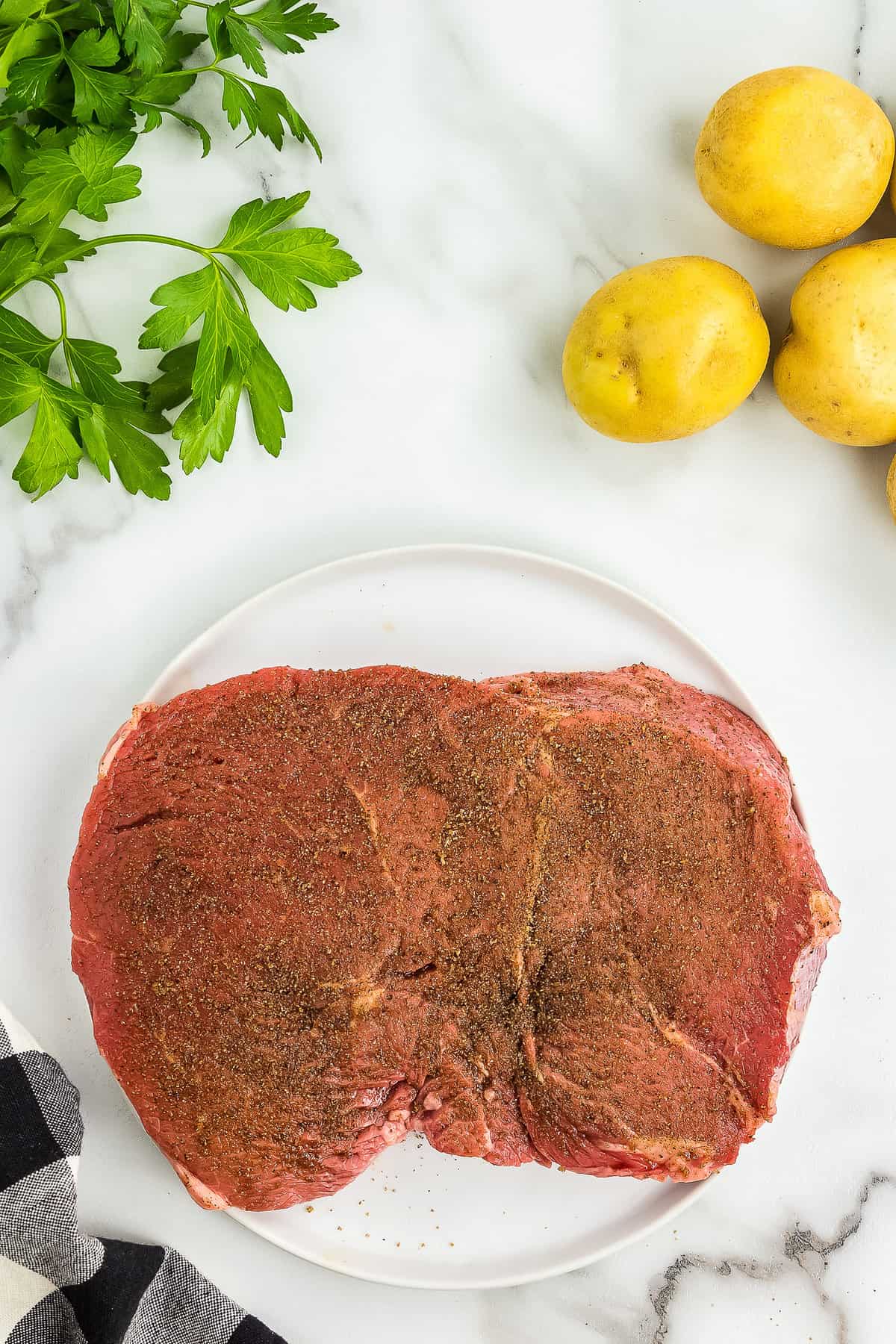 Sirloin steak with beef rub on it