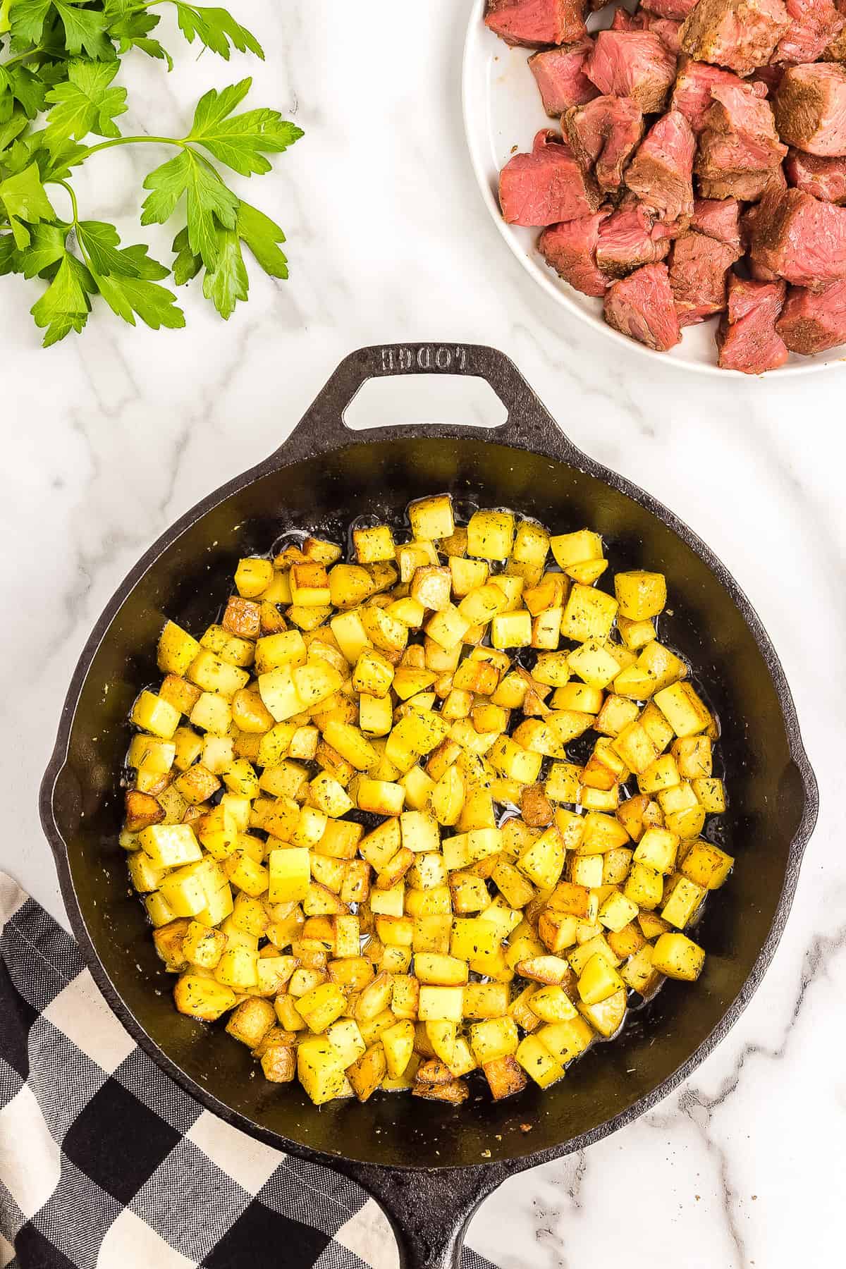 Cast iron pan with crispy potatoes