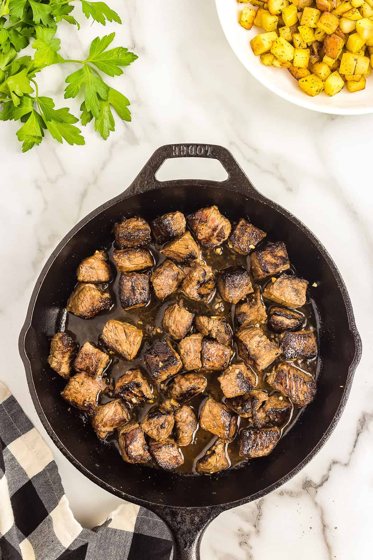 Cast iron pan with steak bites