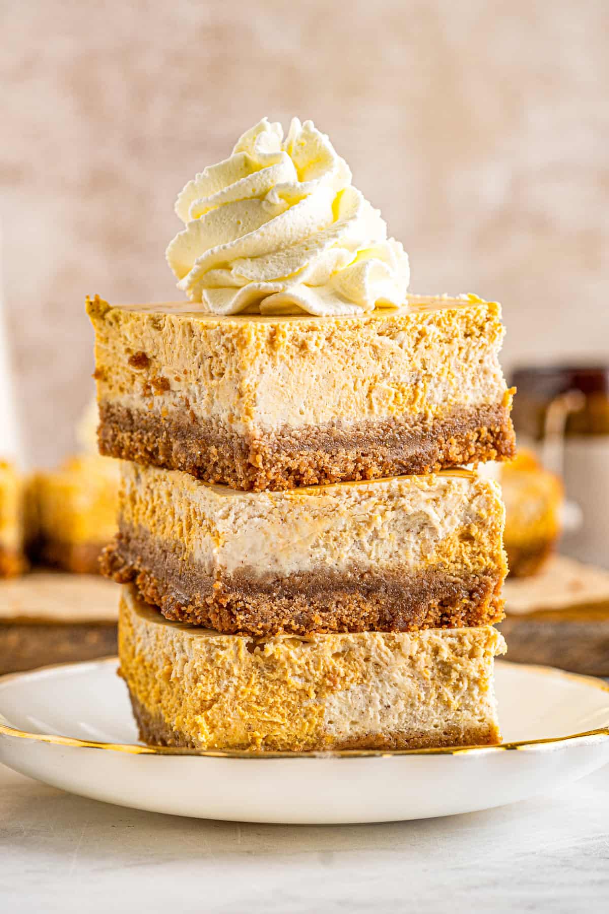 Stack of pumpkin cheesecake bars