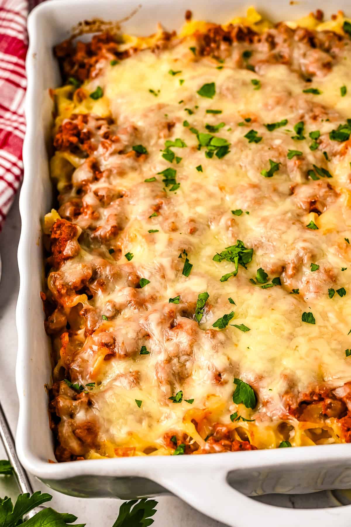 White casserole dish with Sour Cream Noodle Bake