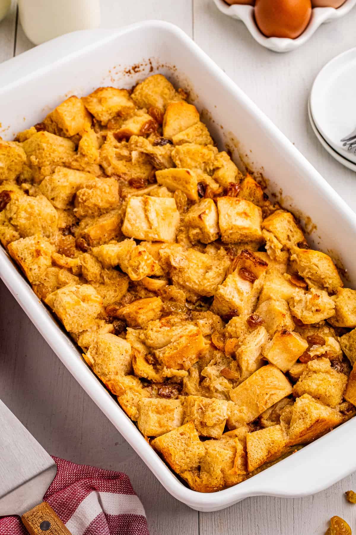 Baked Bread Pudding in white casserole dish