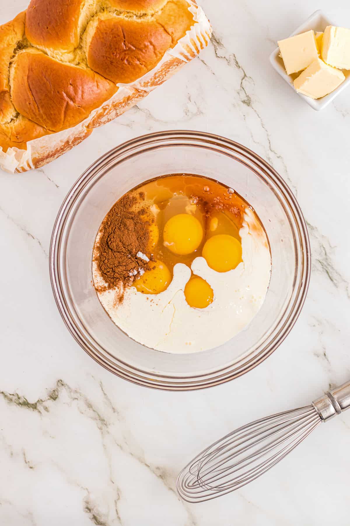 Bowl with custard ingredients for French Toast