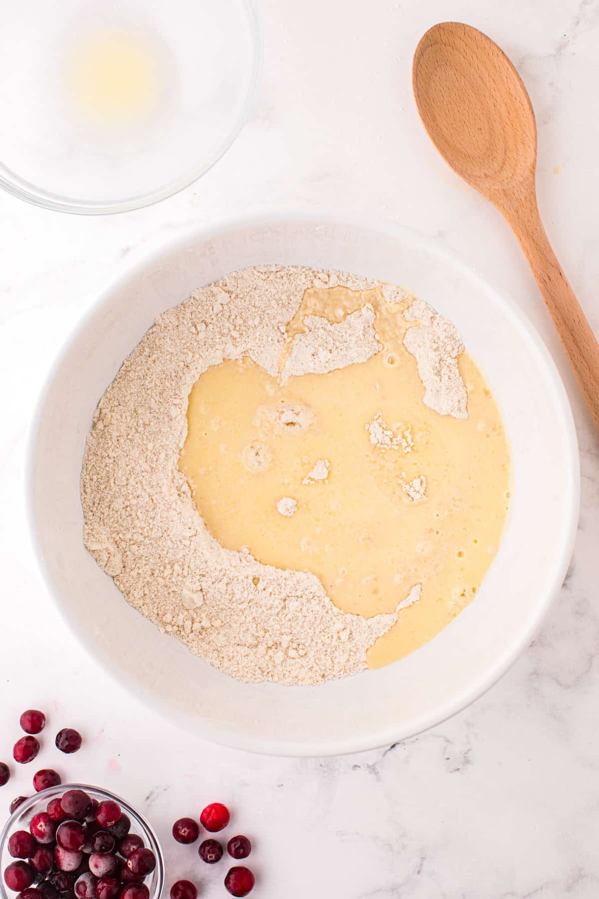 Bowl with wet and dry ingredients for scone