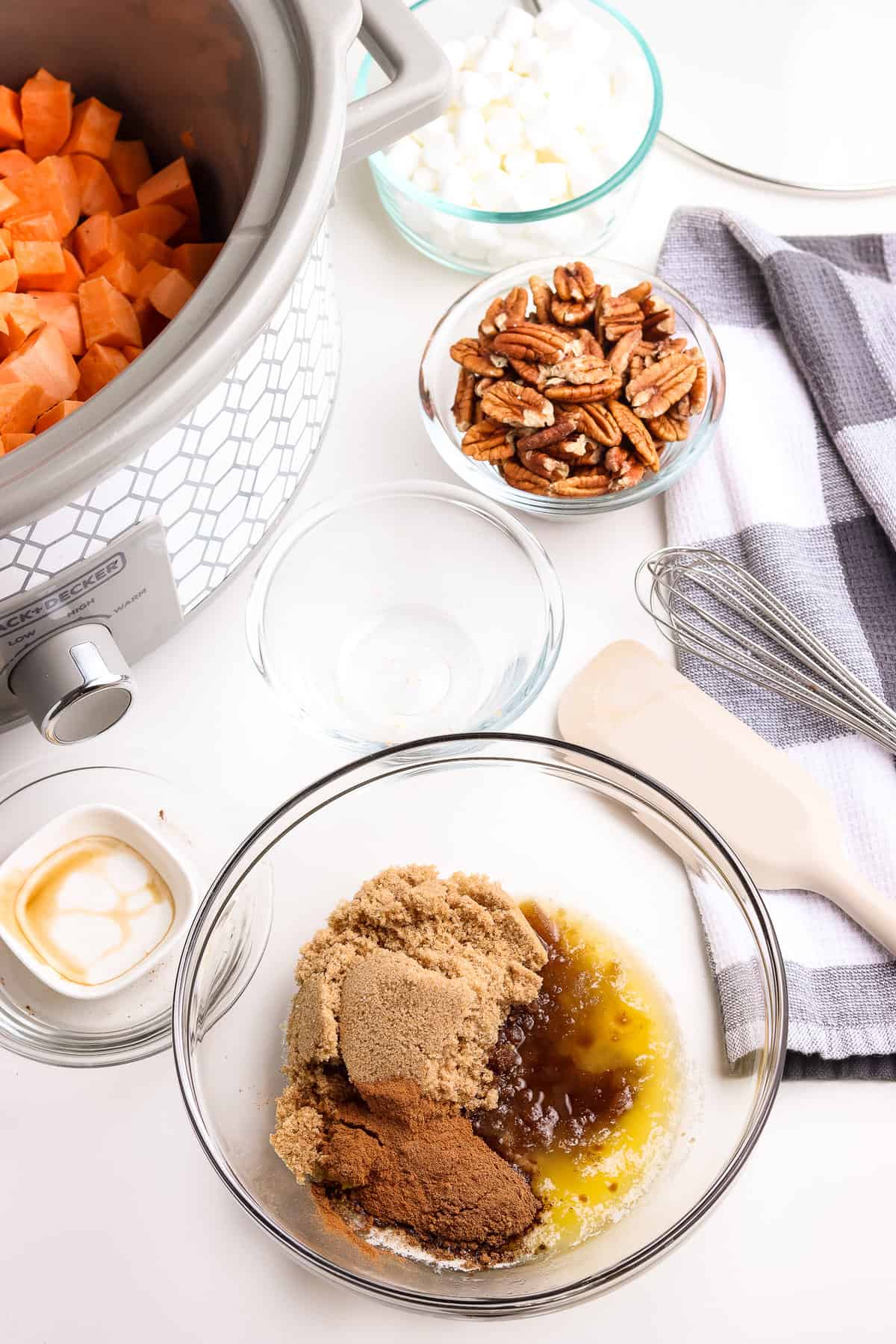 small glass bowl with brown sugar, spices, melted butter