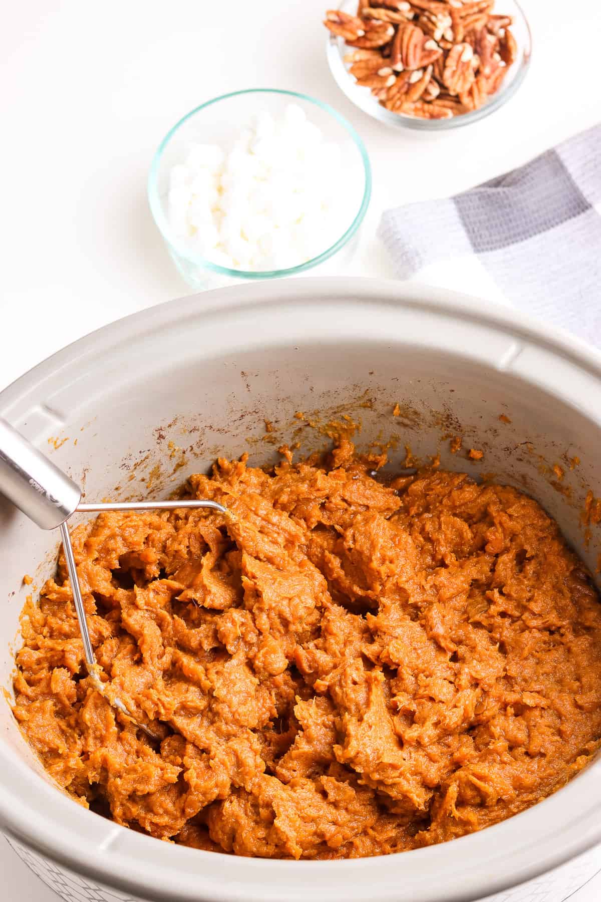 Mashed sweet potatoes in slow cooker