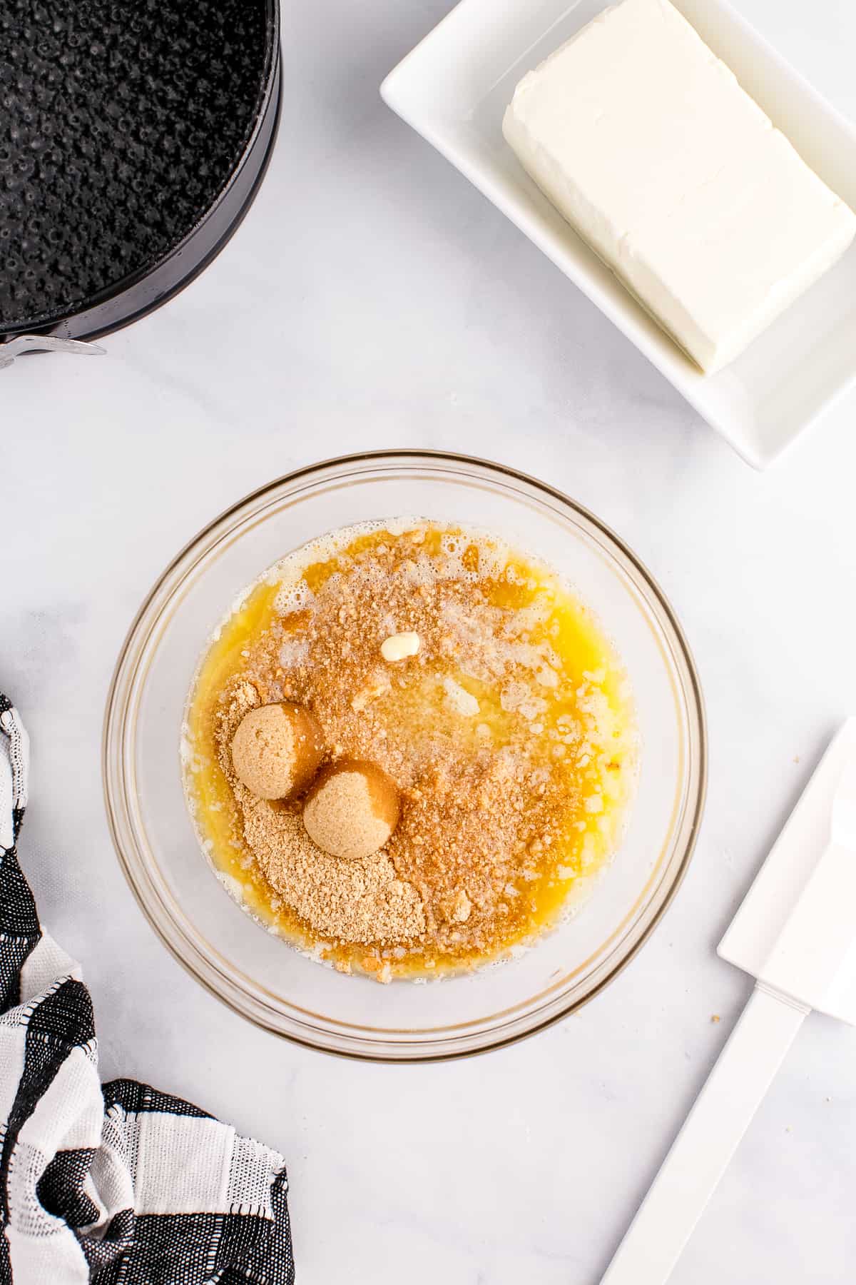 Bowl with graham cracker crust ingredients in it