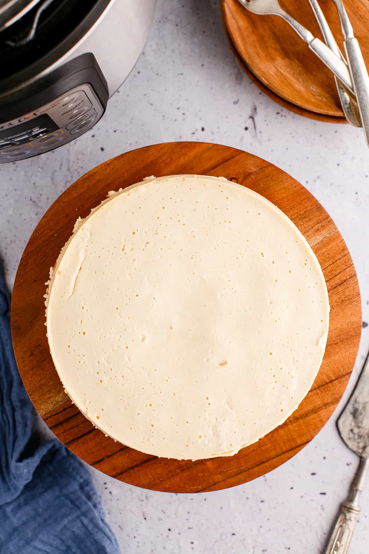 Cheesecake on wooden serving platter