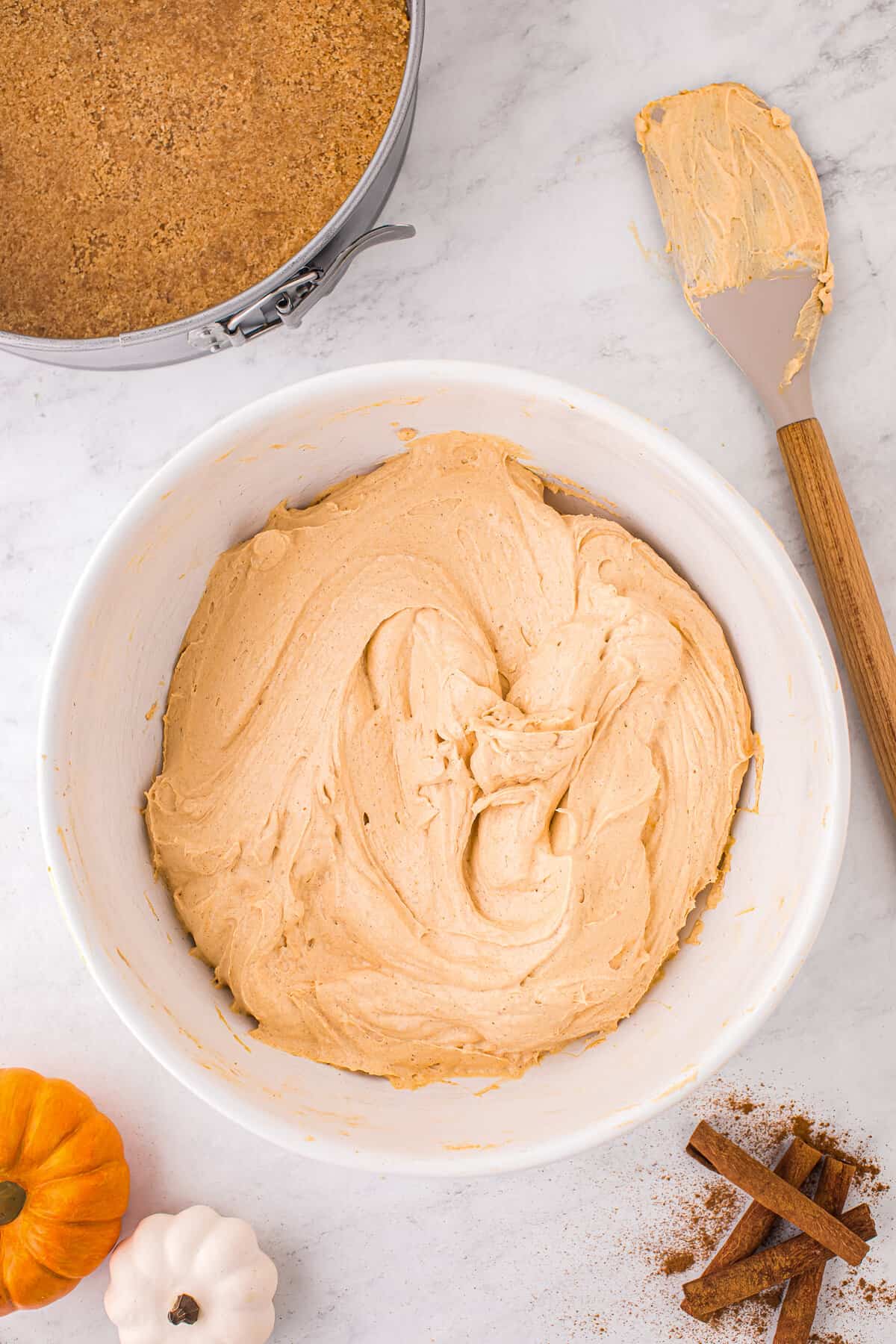 Bowl with pumpkin cheesecake filling