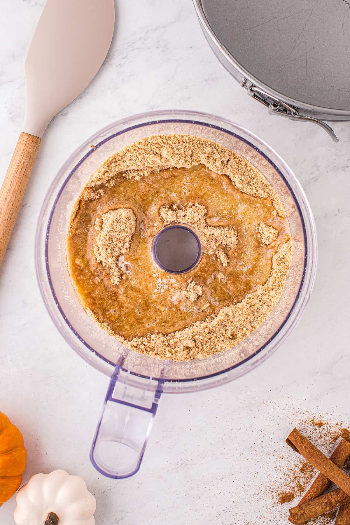 Melted butter and wafer crumbs in food processor