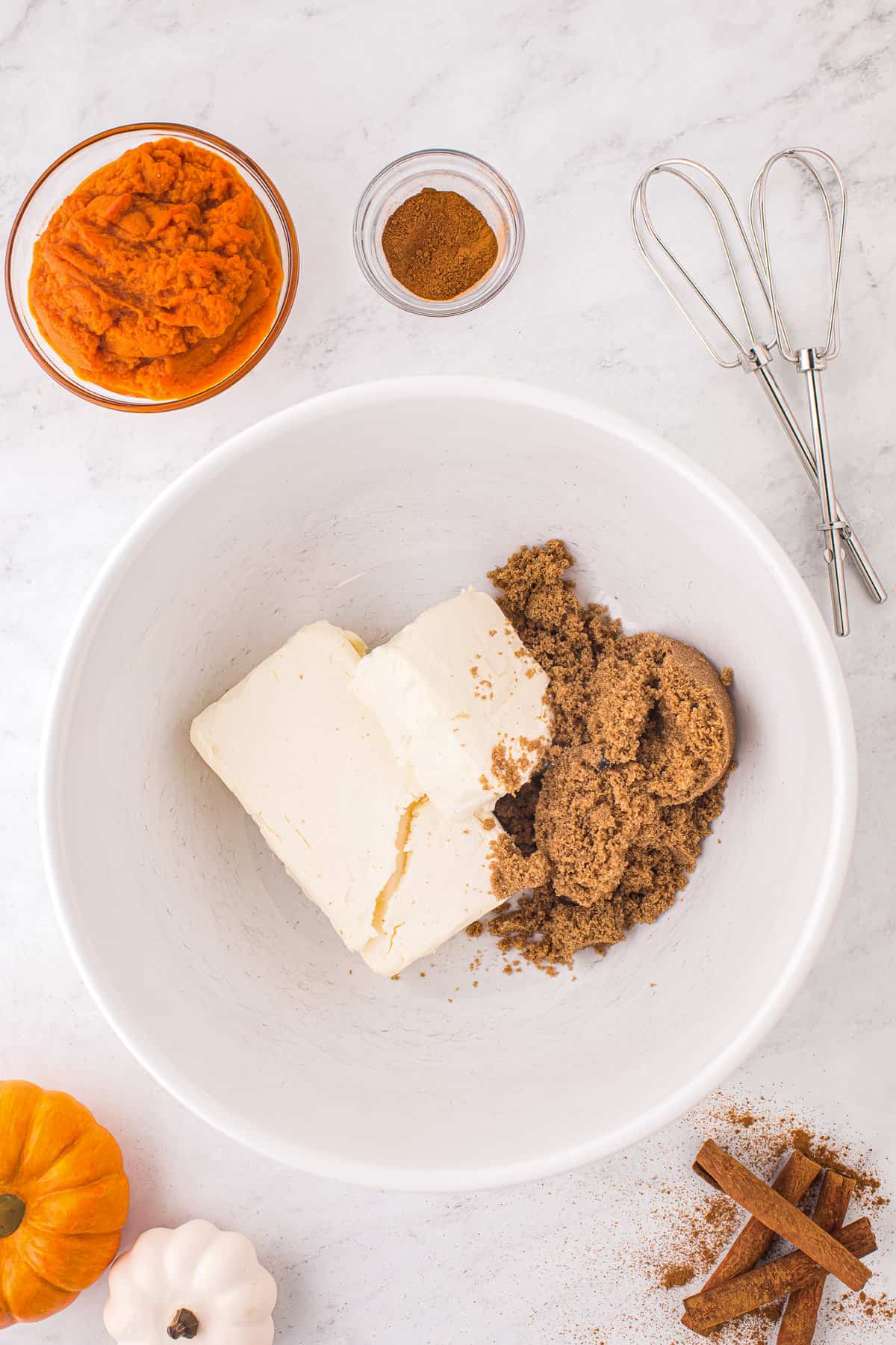 Cream cheese and brown sugar in bowl