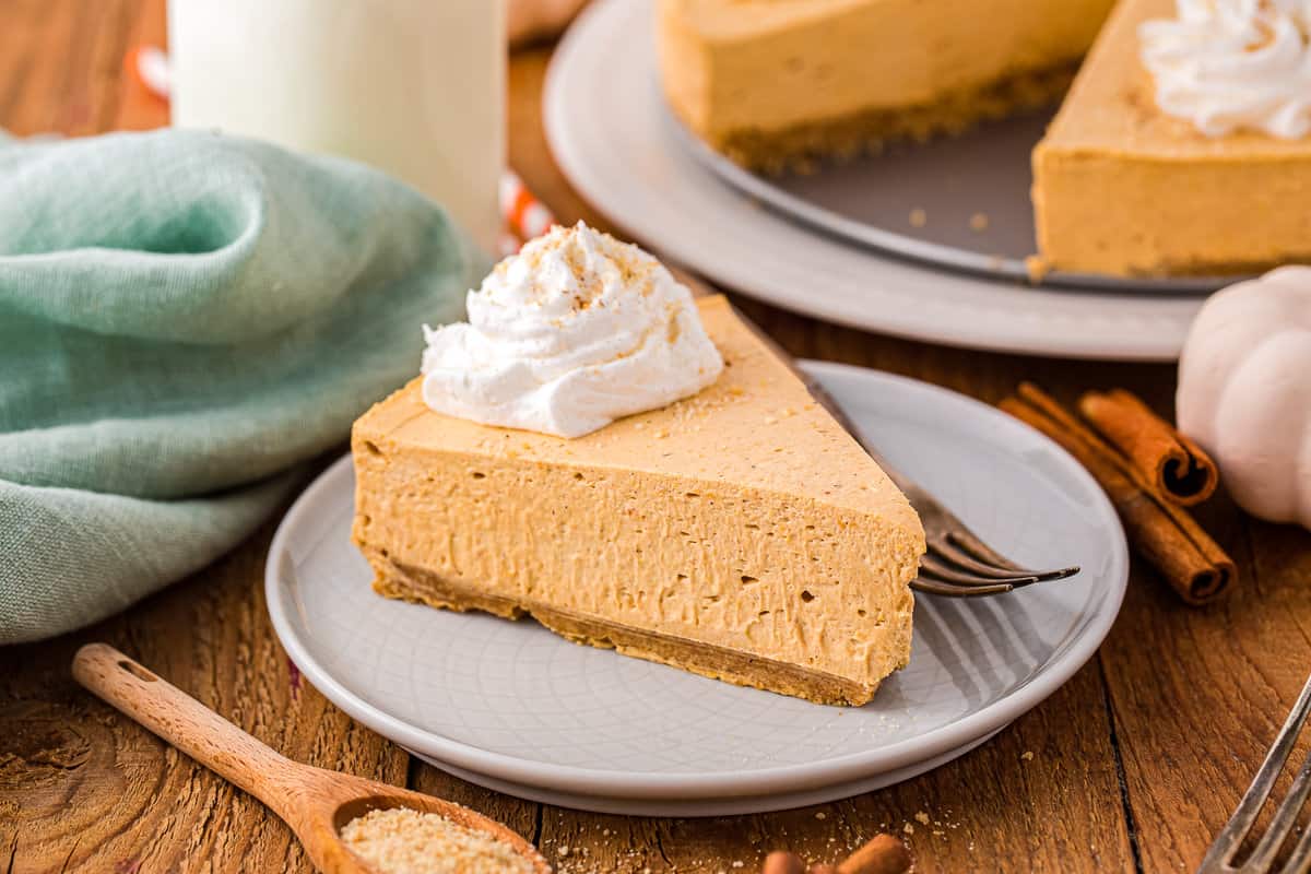 Slice of No Bake Pumpkin Cheesecake on plate