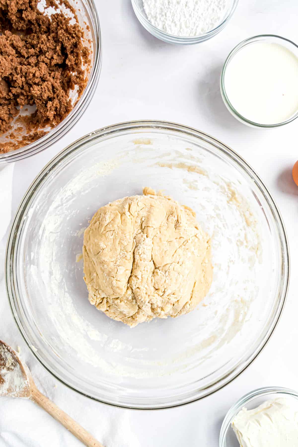 Glass bowl with dough ball for cinnamon rolls