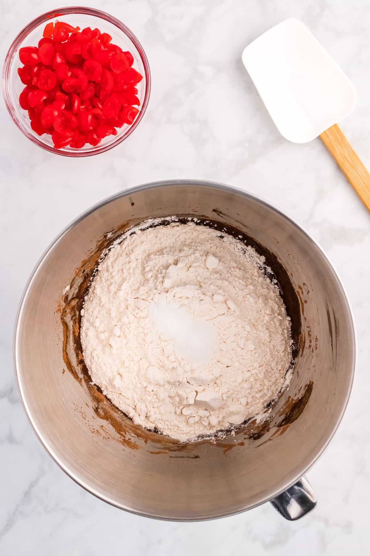 Flour in mixing bowl with chocolate cookie dough