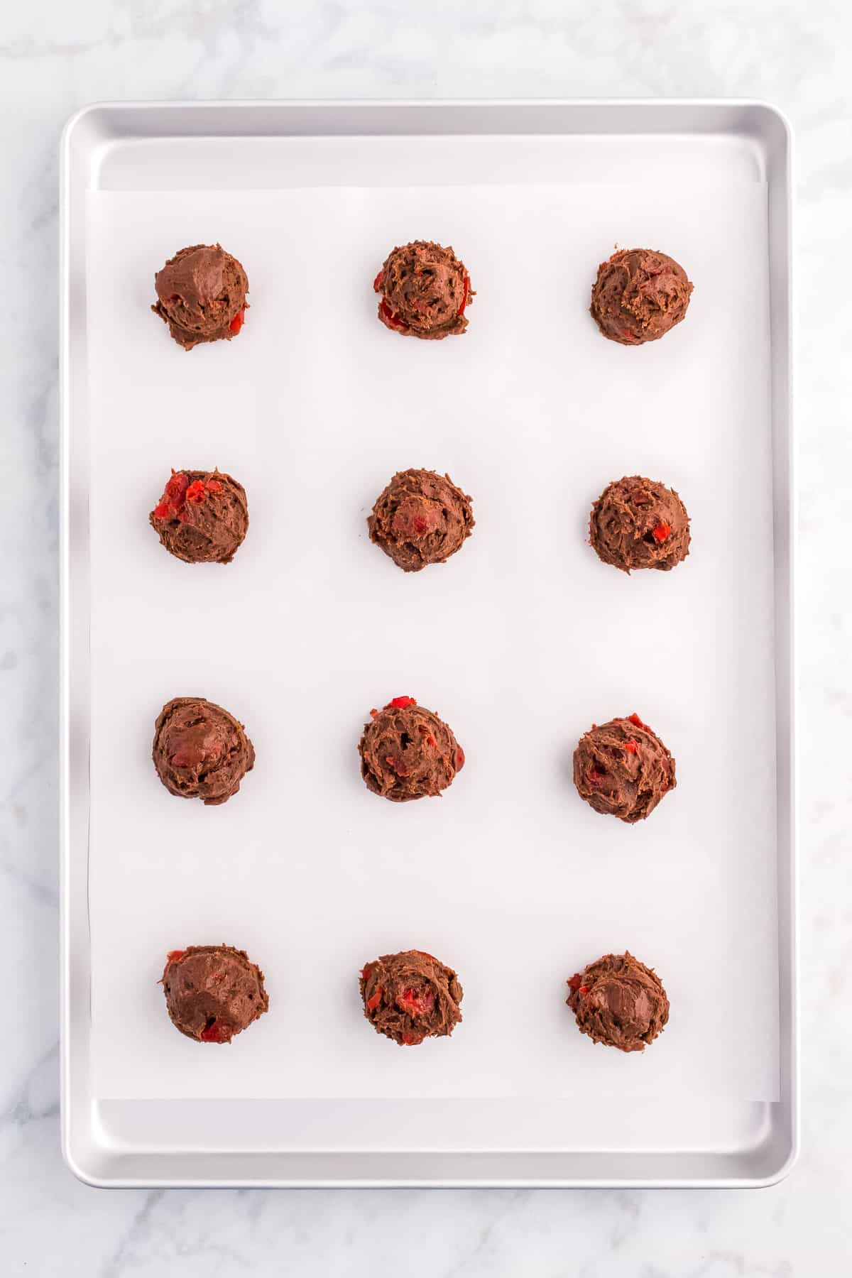 Overhead image of chocolate cherry cookie dough