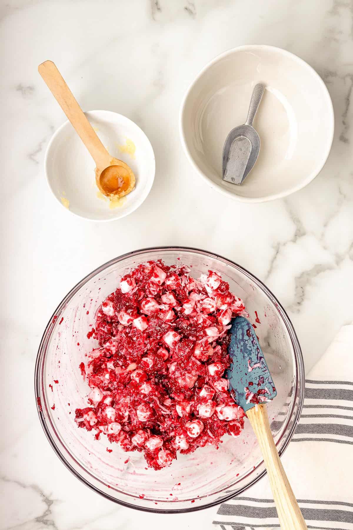 Bowl with mixed ingredients for cranberry fluff salad