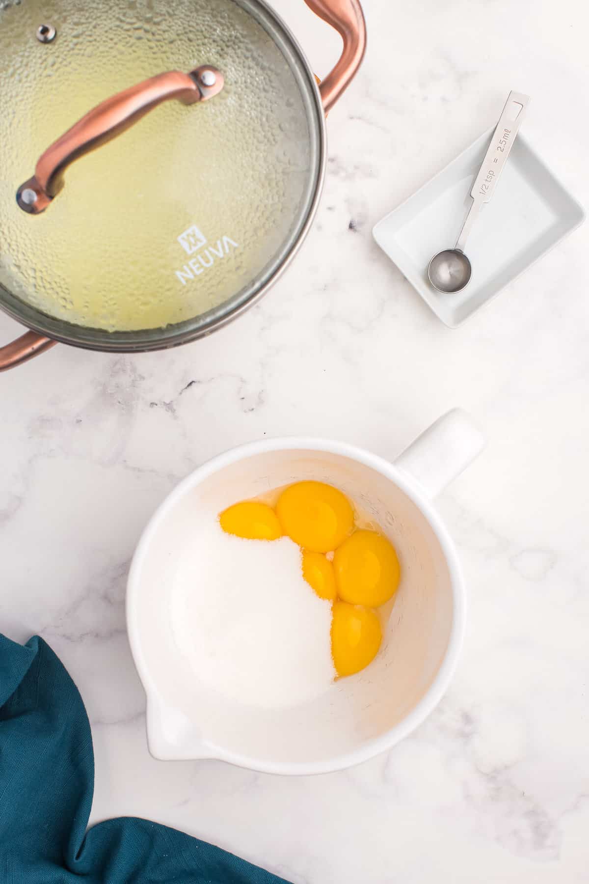 Bowl with cream and egg yolks