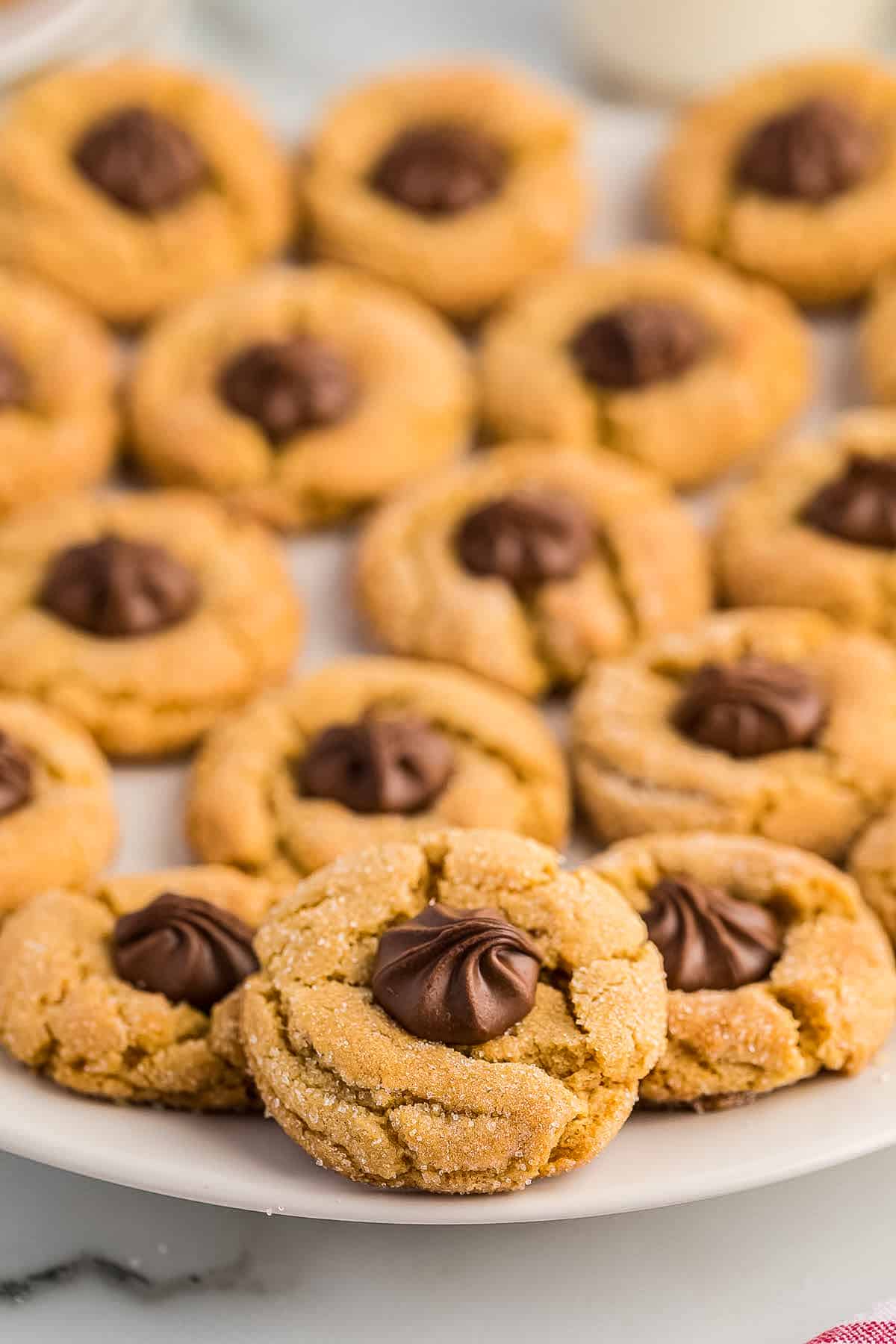 White plate with Peanut Butter Blossoms on it